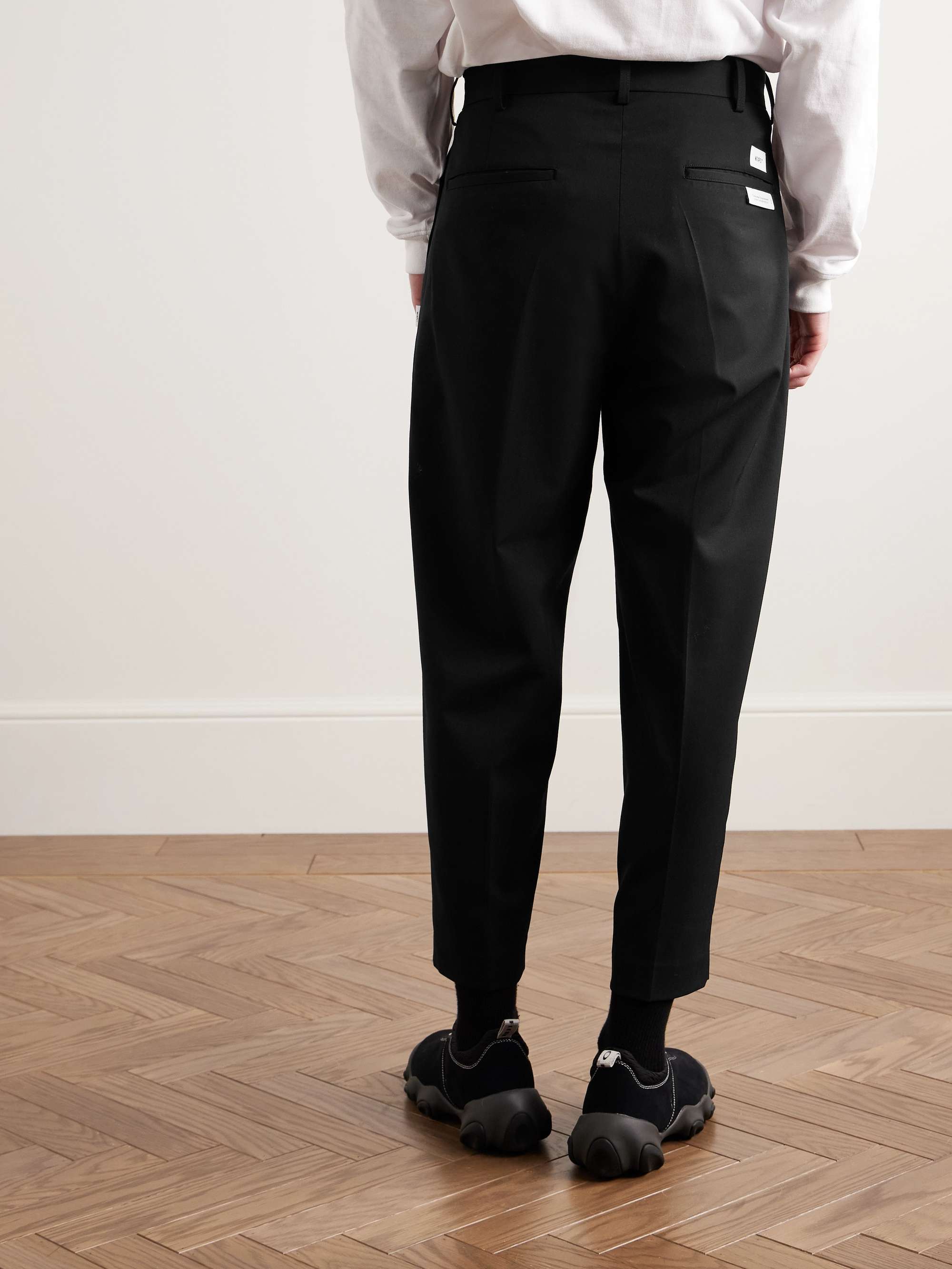Cropped Tapered Logo-Appliquéd Pleated Twill Trousers view