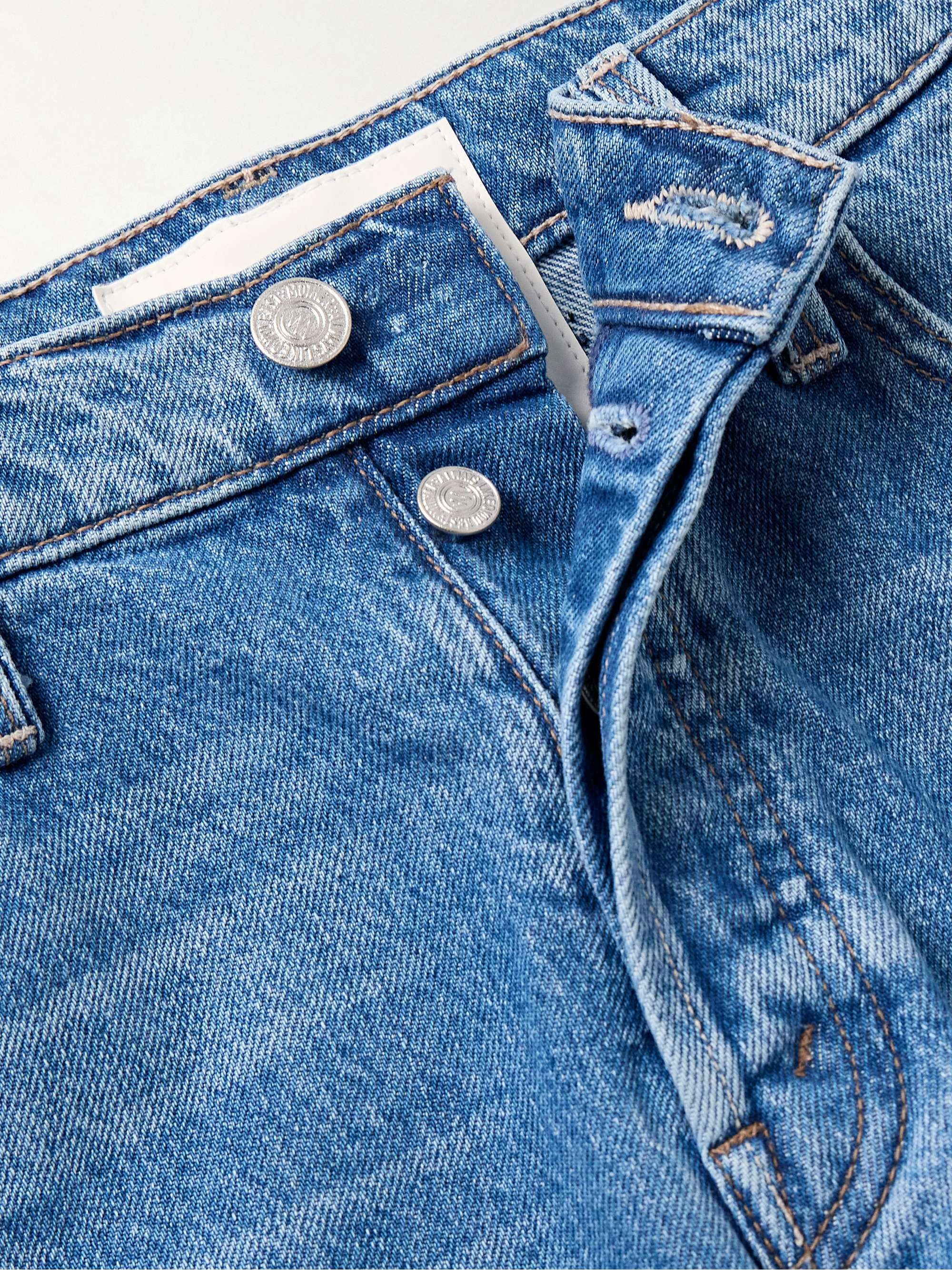 The Smarty mid-rise slim-leg jeans view