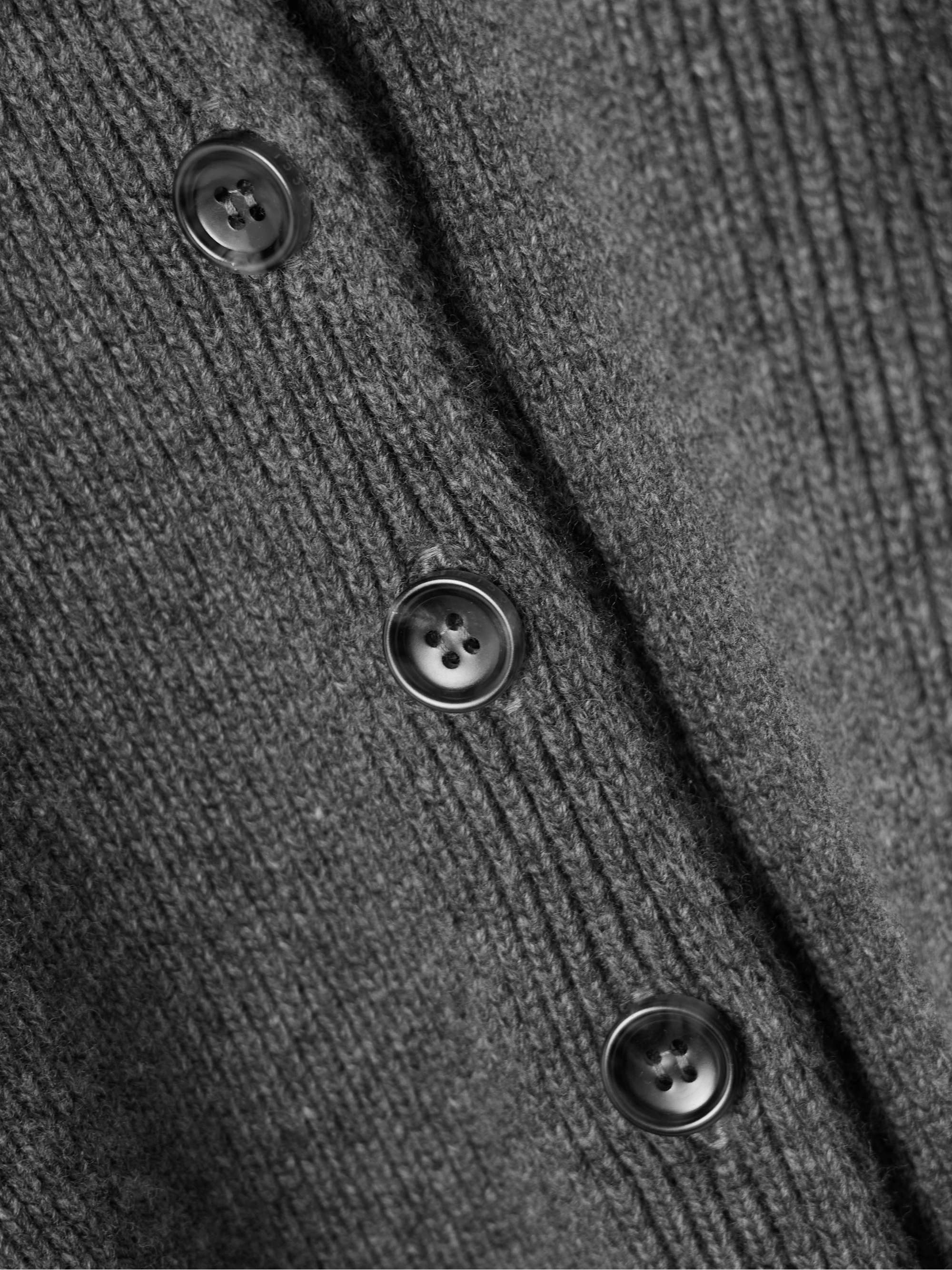 Crystal-embellished logo-jacquard ribbed wool polo shirt view