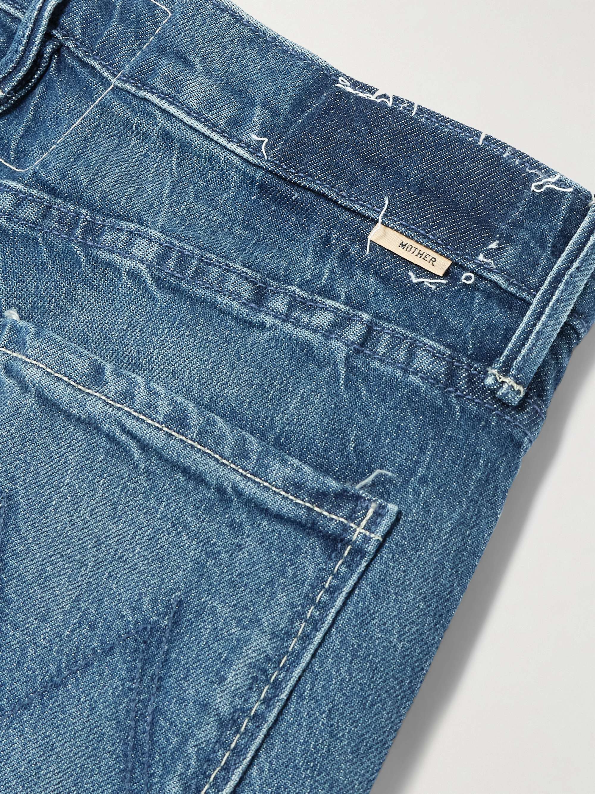 The Twister Sneak distressed high-rise wide-leg jeans view