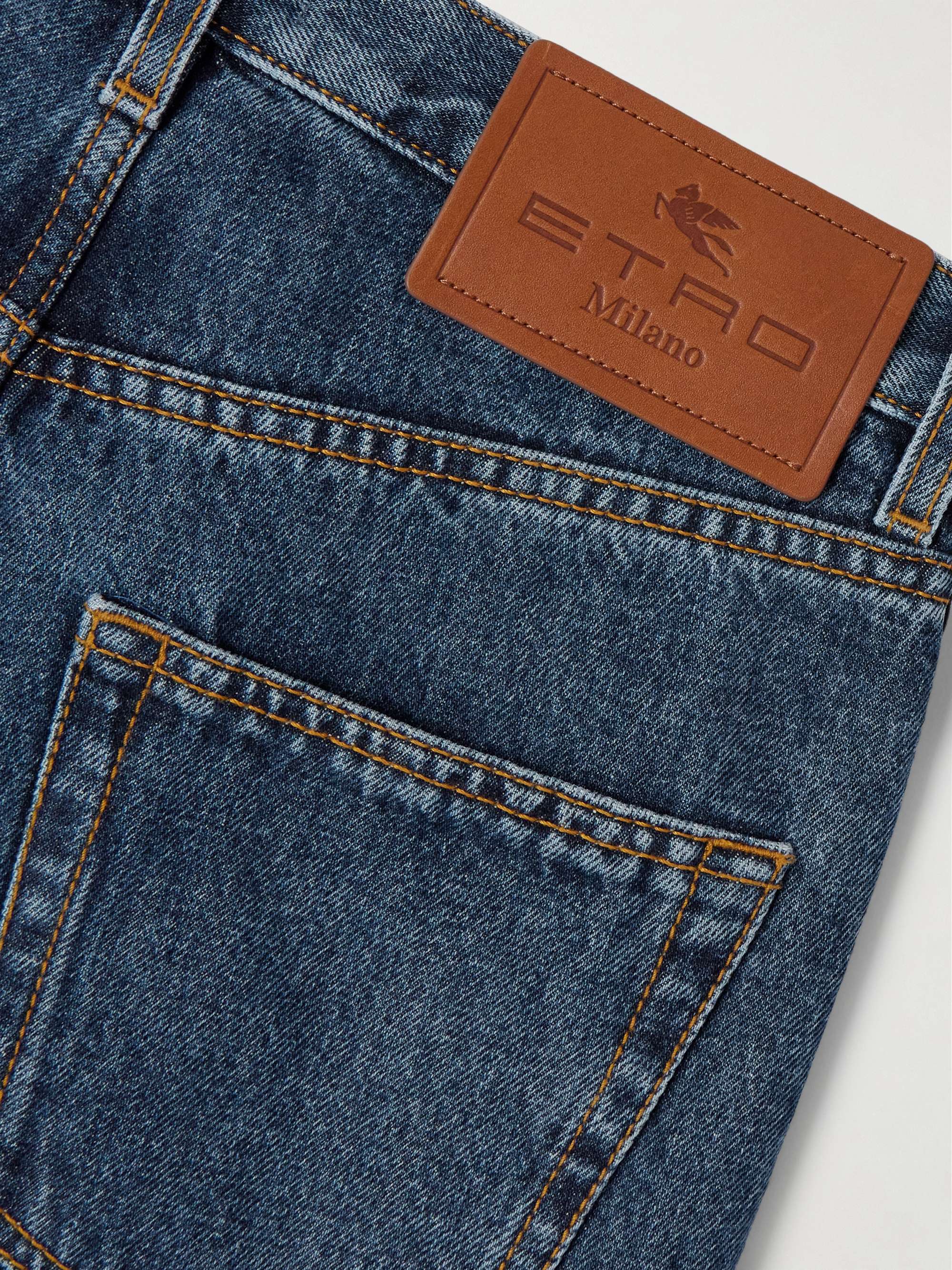 Embroidered high-rise slim-leg jeans view
