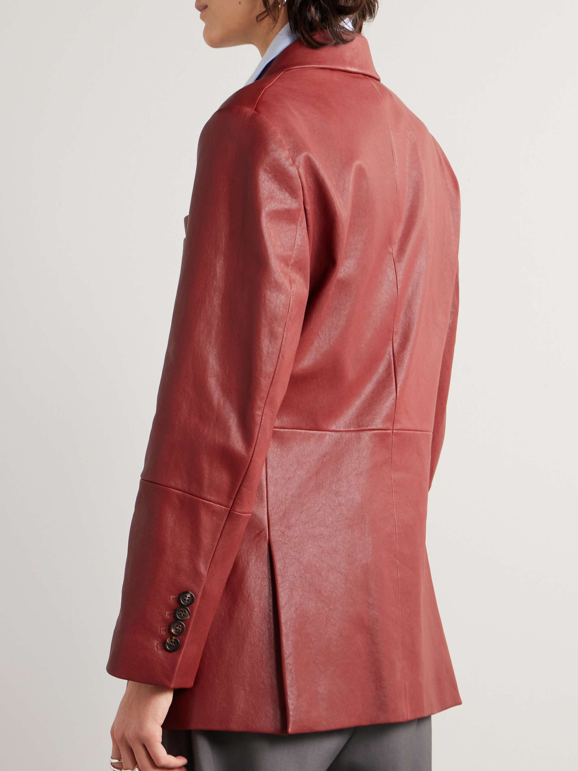 Paneled textured-leather blazer view