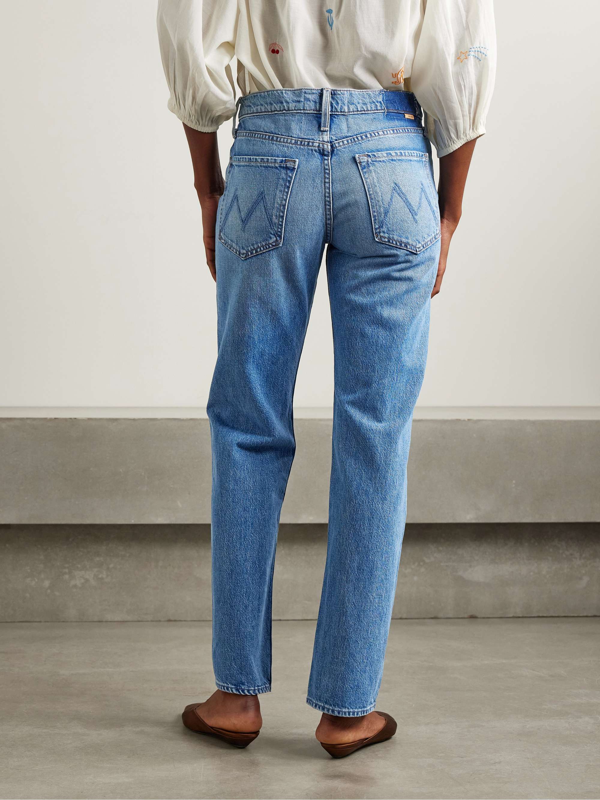 The Smarty mid-rise slim-leg jeans view