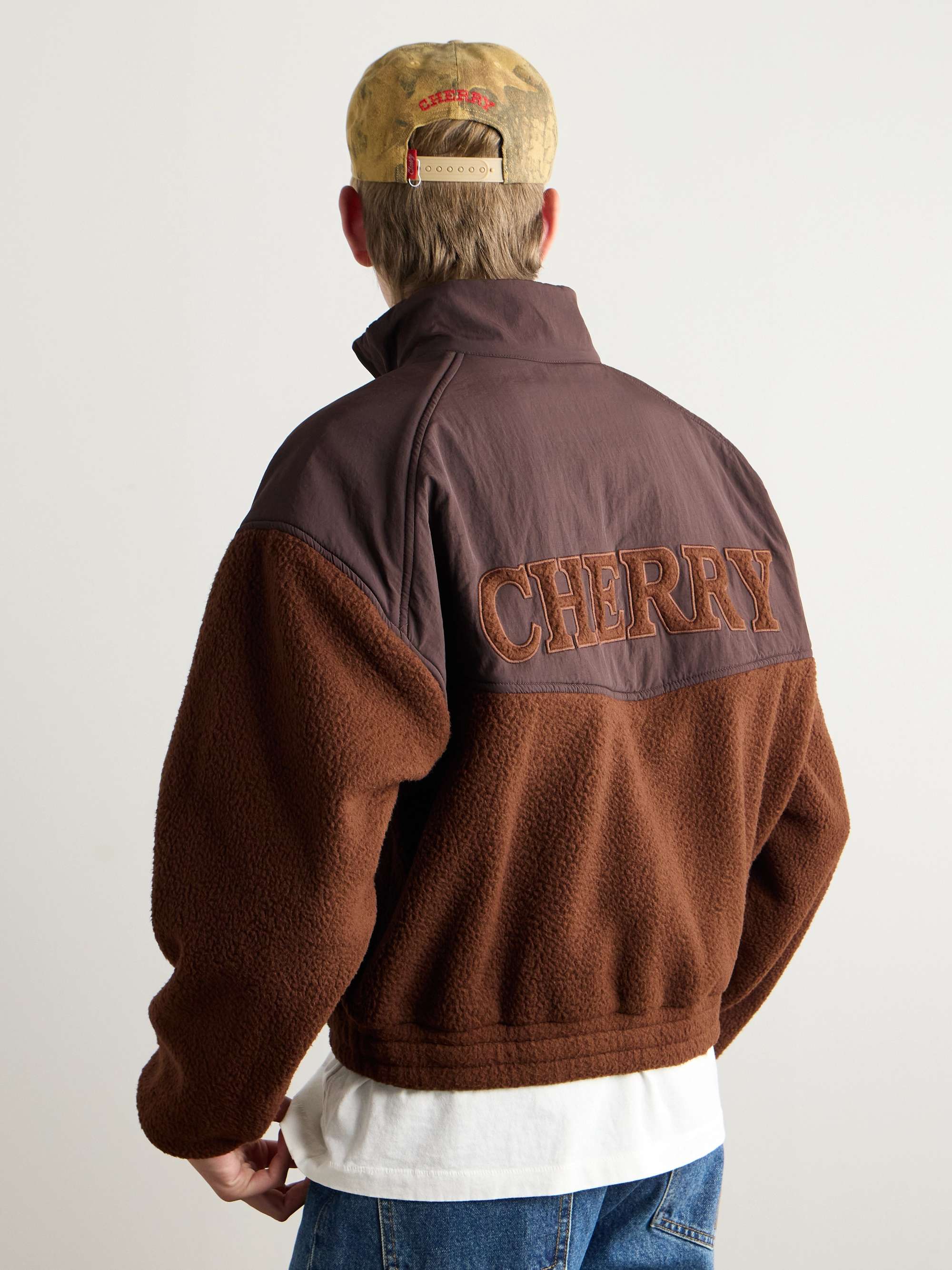Logo-Appliquéd Shell-Panelled Fleece Jacket view