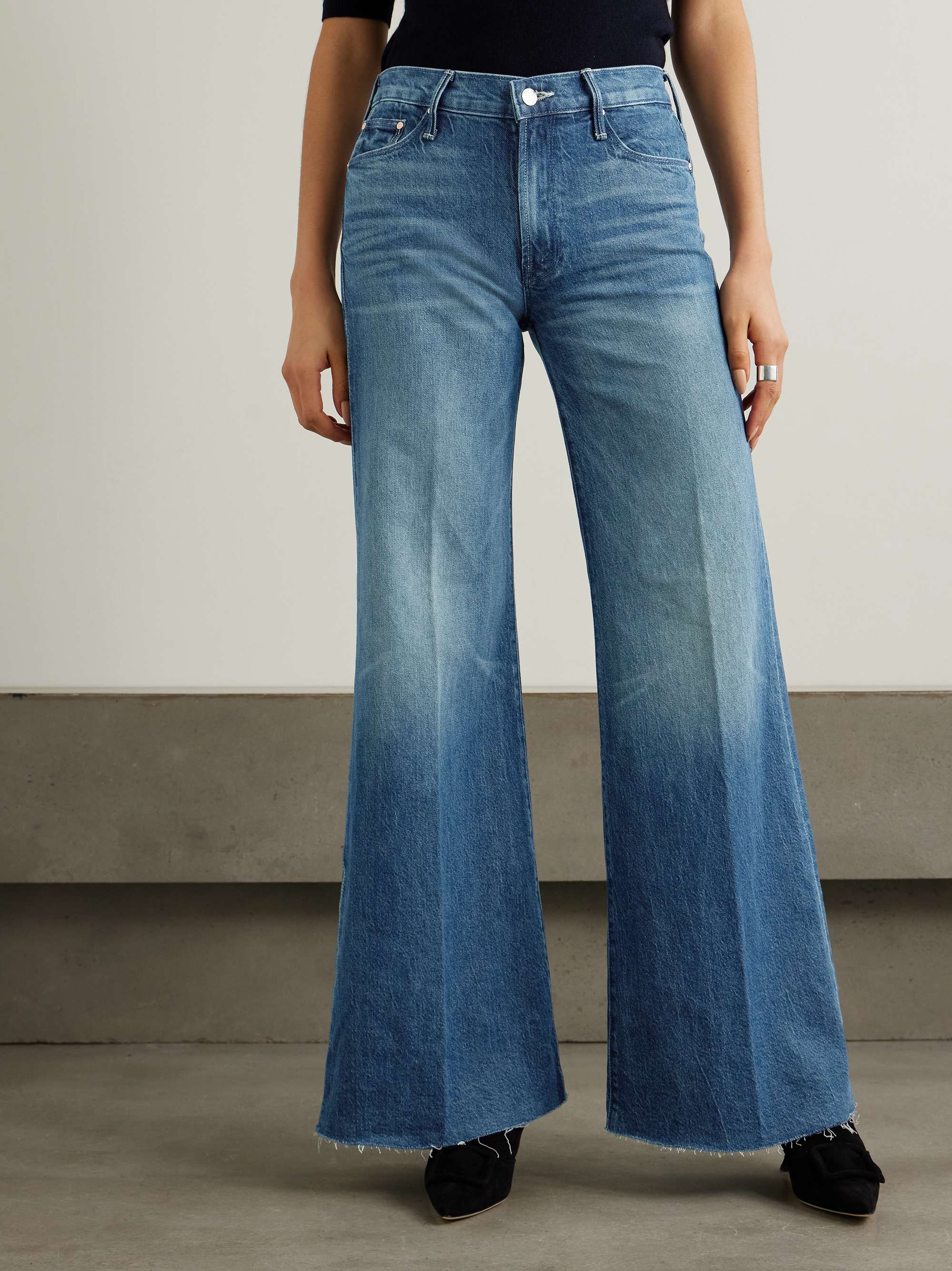 The Twister Sneak distressed high-rise wide-leg jeans view
