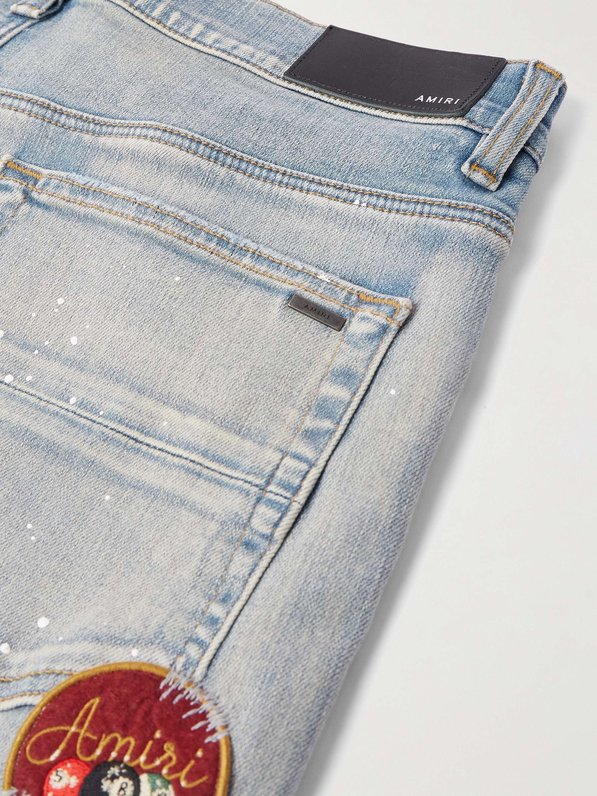Skinny-Fit Appliquéd Distressed Paint-Splattered Jeans view