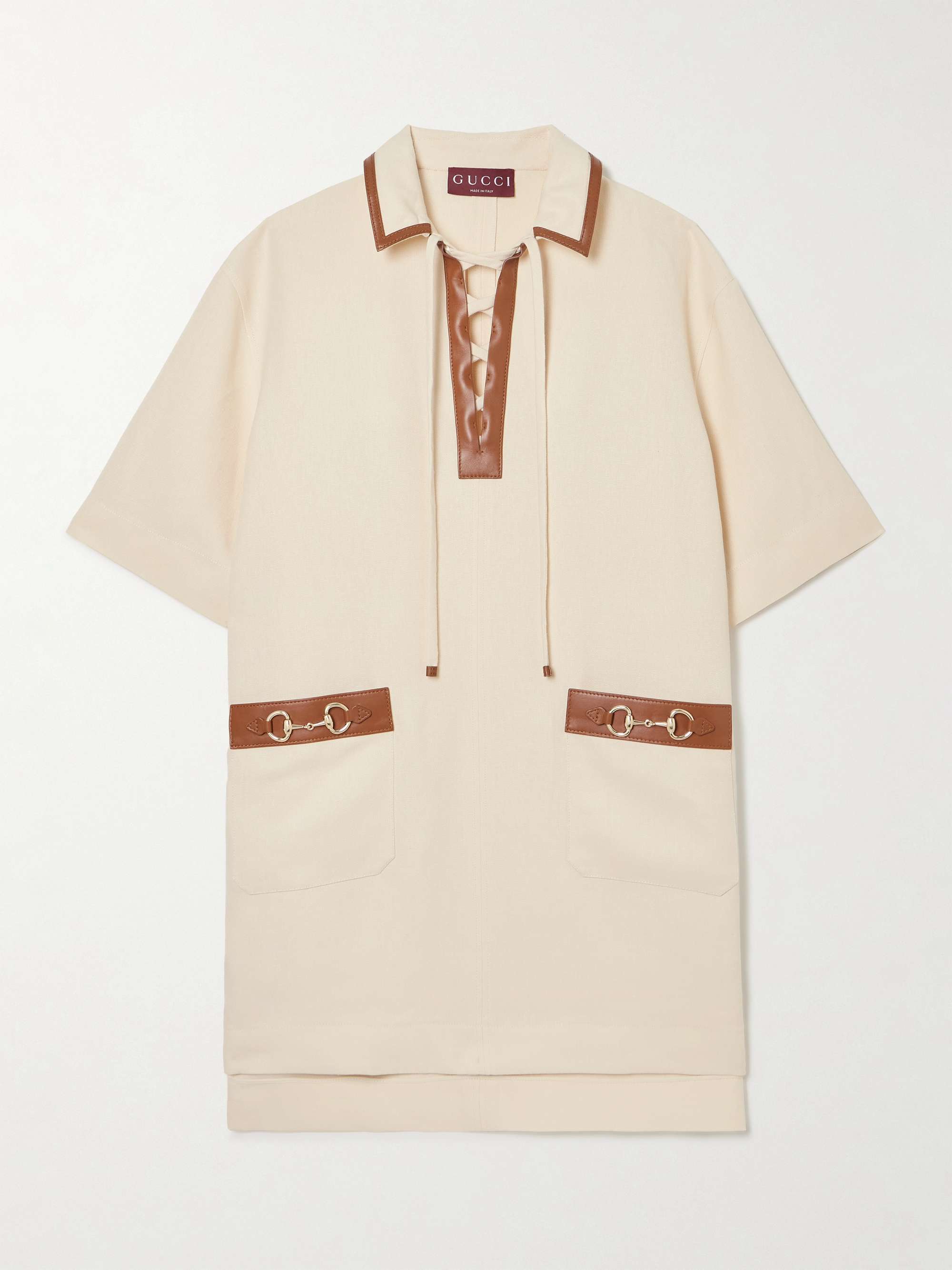 Horsebit-embellished leather-trimmed linen mini dress hero visual