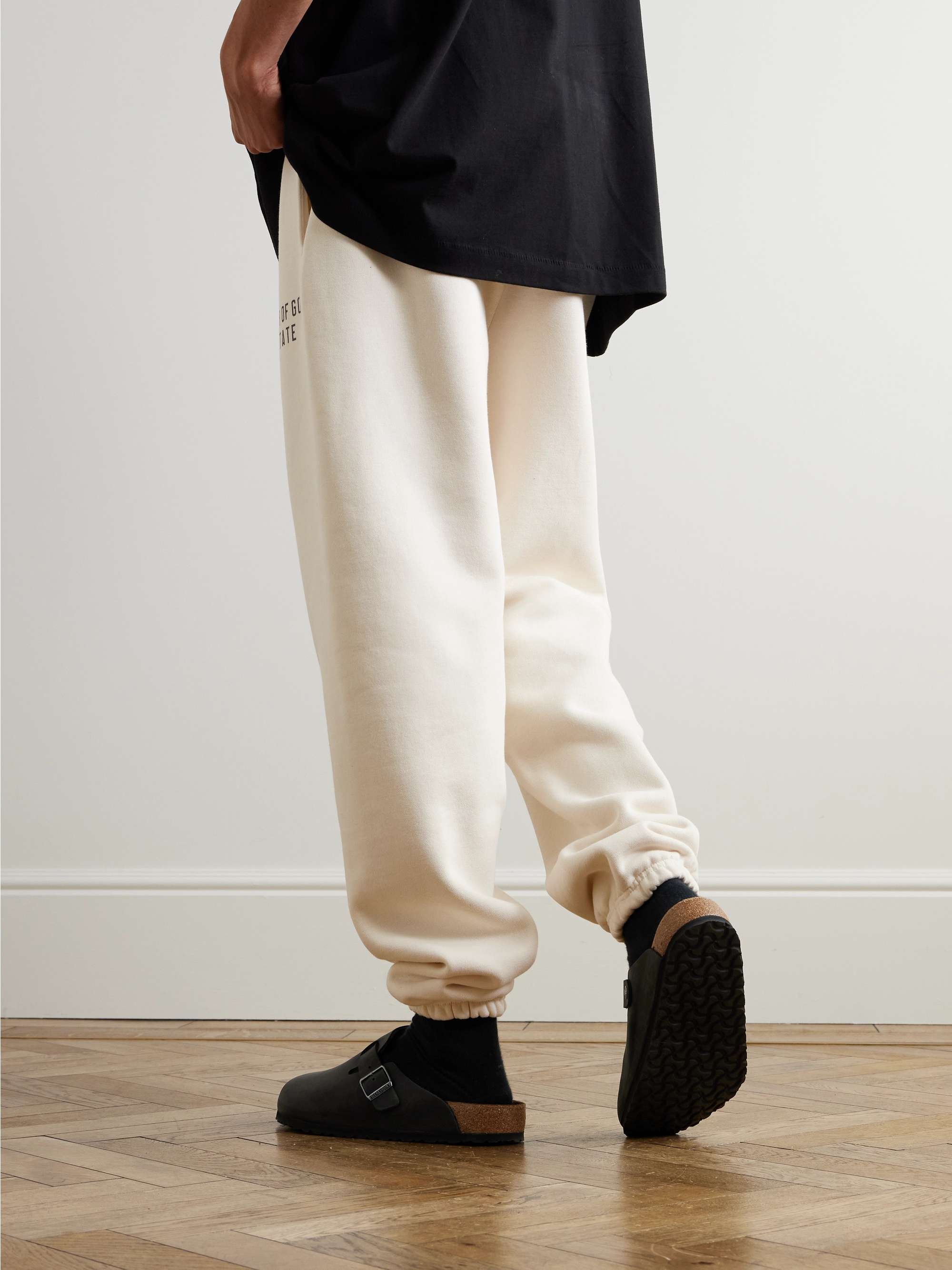 Tapered Logo-Print Appliquéd Cotton-Blend Jersey Sweatpants view