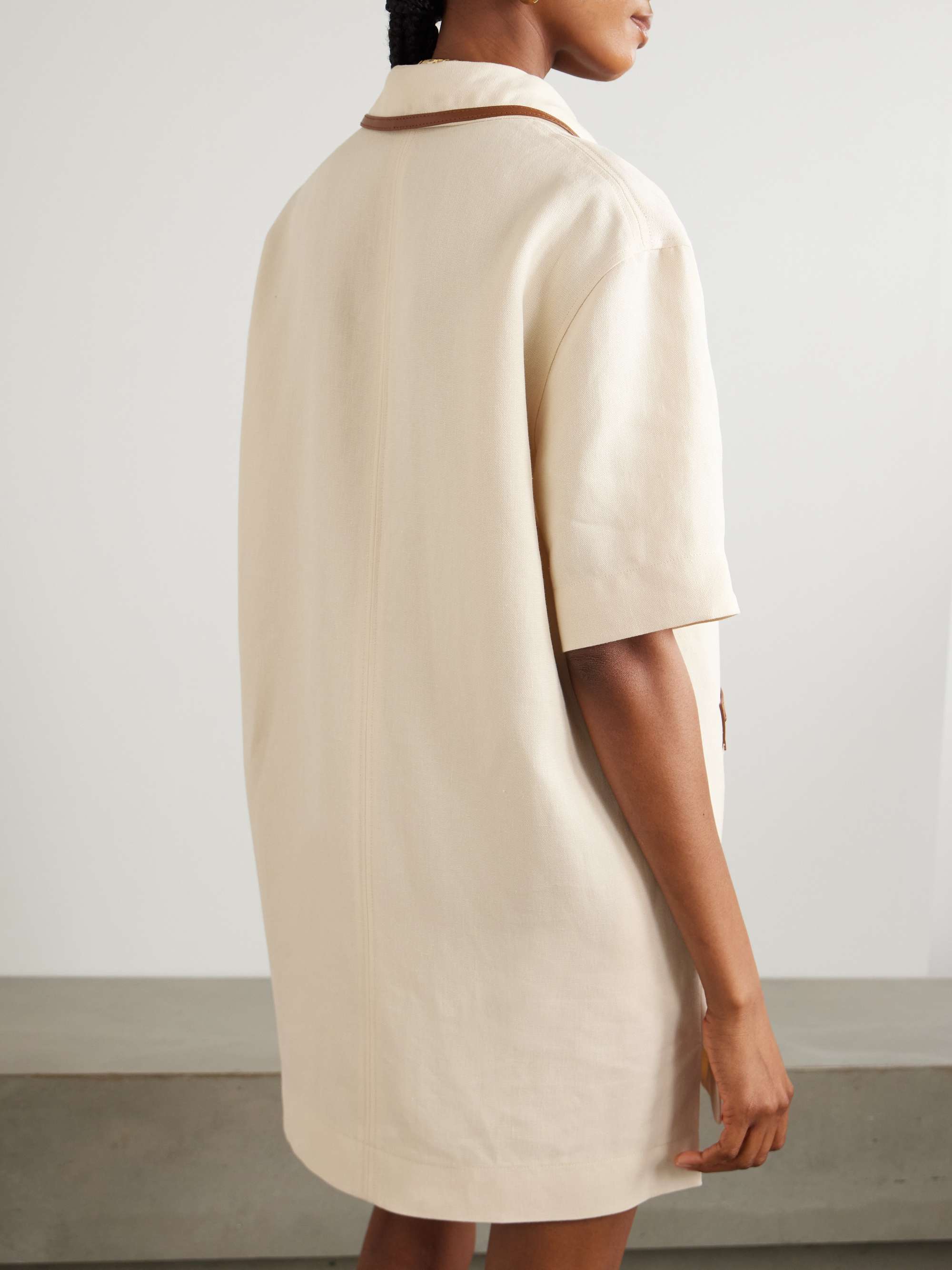 Horsebit-embellished leather-trimmed linen mini dress view