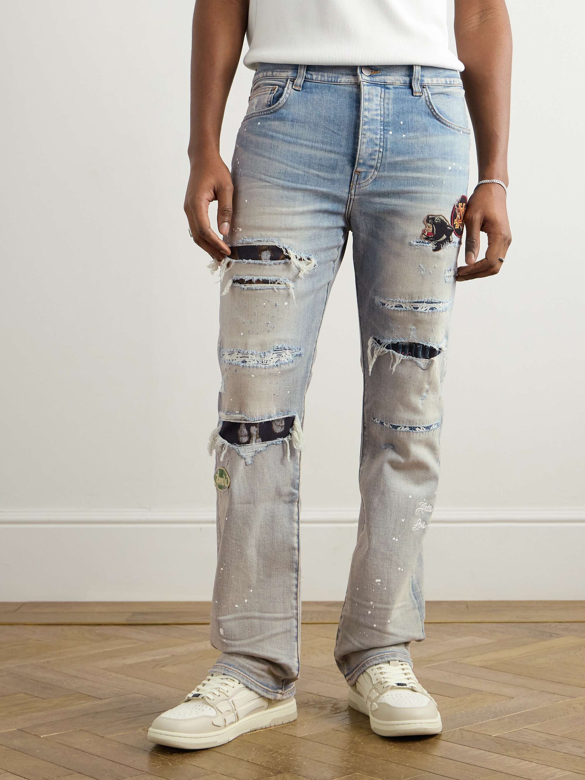 Skinny-Fit Appliquéd Distressed Paint-Splattered Jeans view
