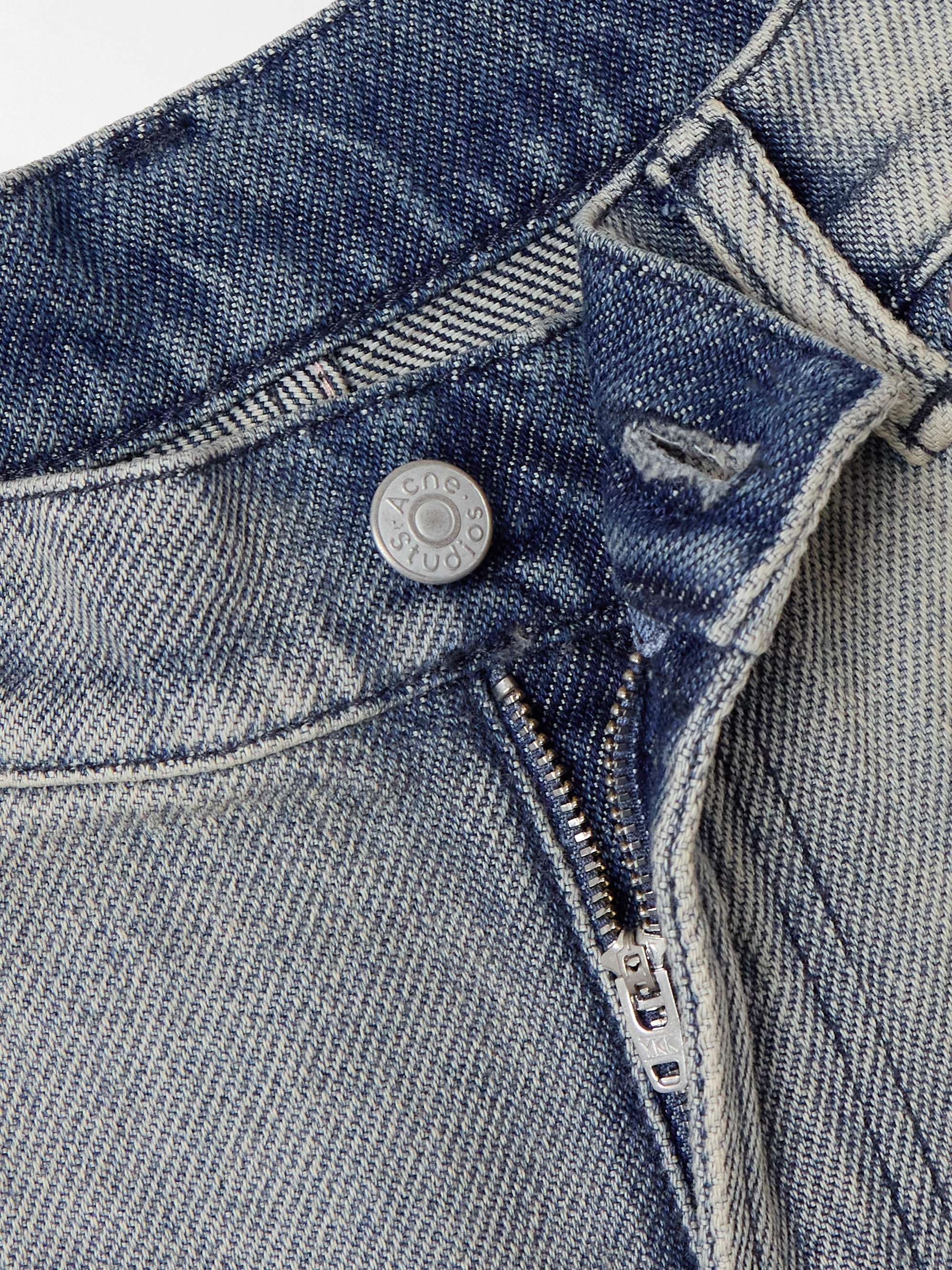 Distressed mid-rise flared jeans view