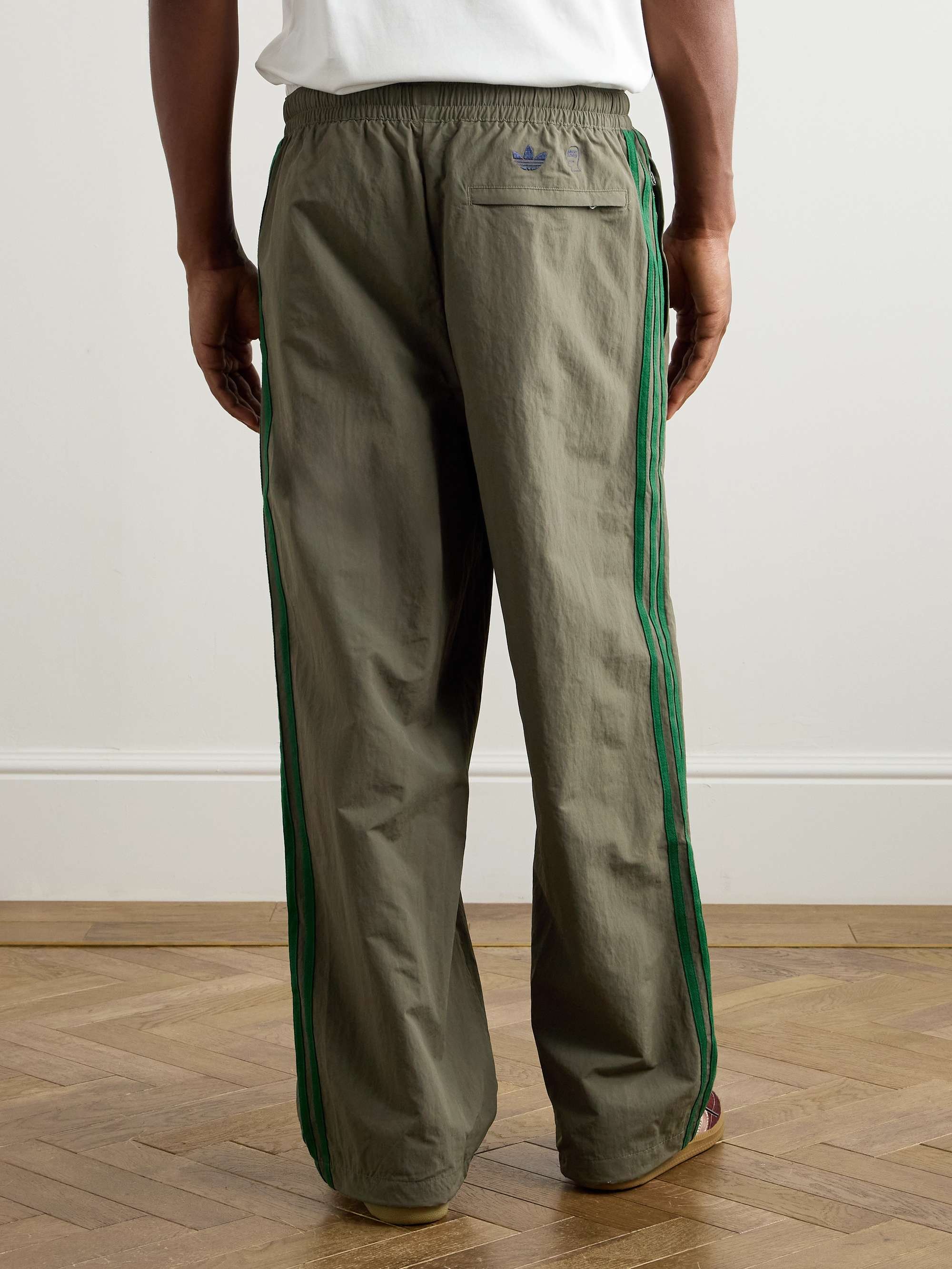 + Brain Dead Wide-Leg Logo-Flocked Striped Shell Track Pants view