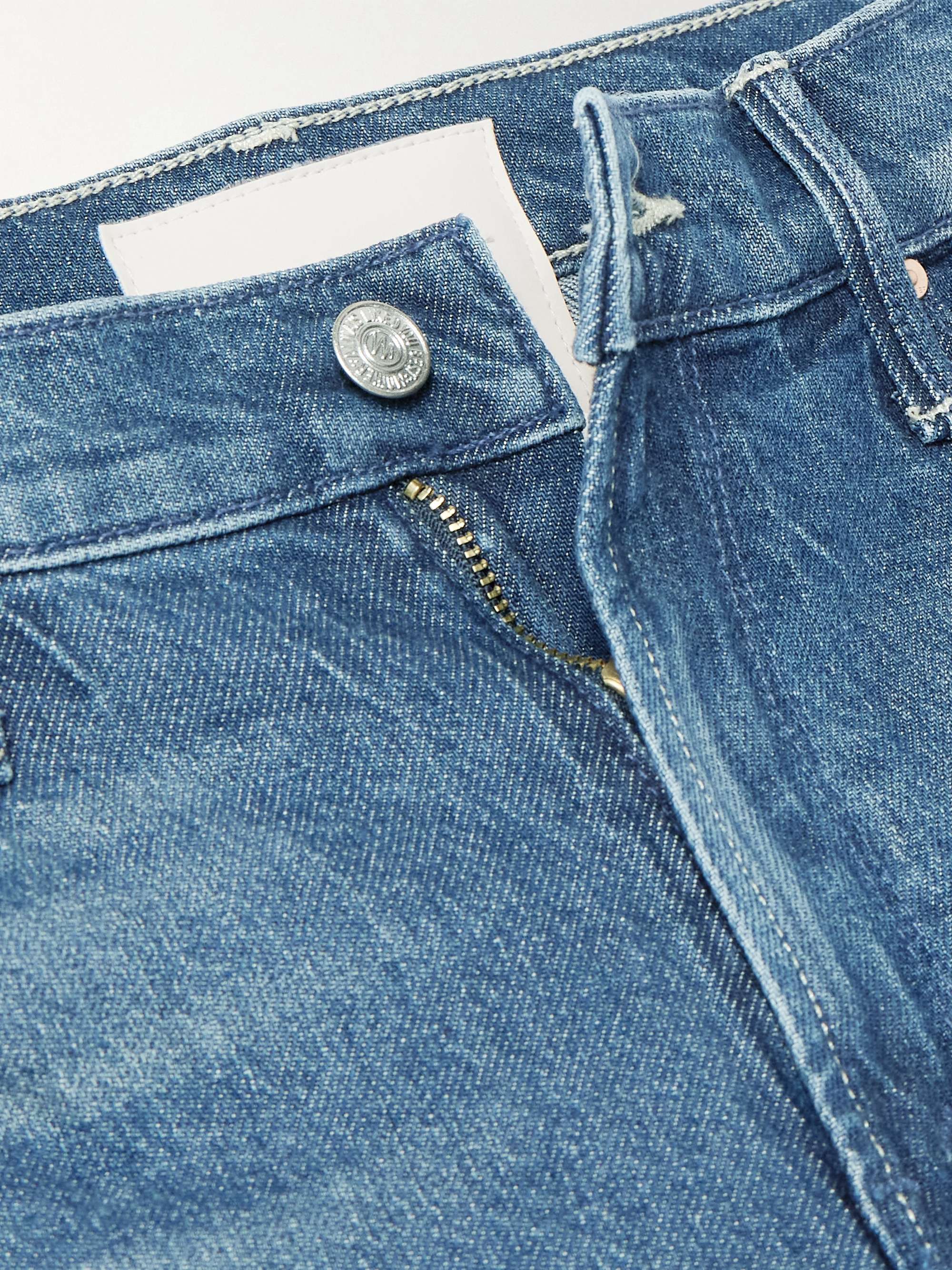 The Twister Sneak distressed high-rise wide-leg jeans view