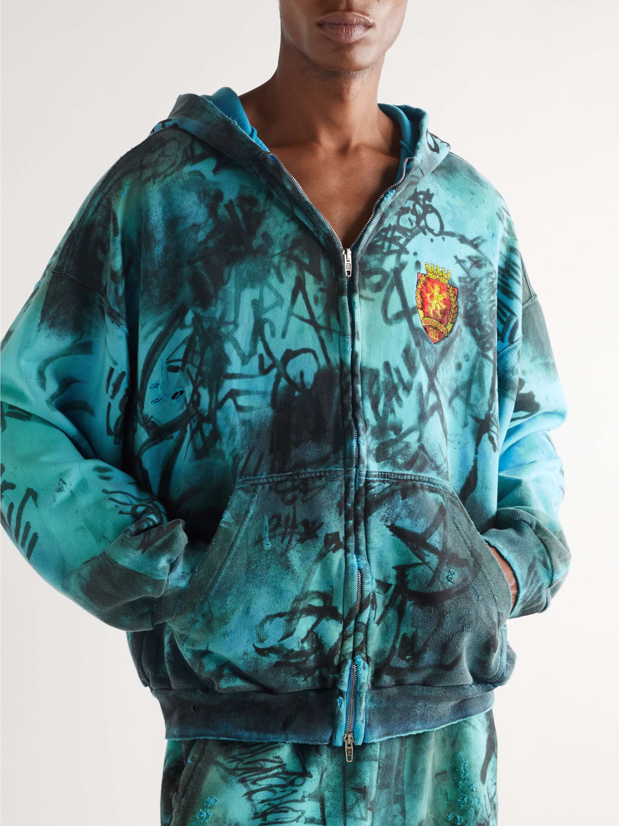 Logo-Appliquéd Distressed Printed Cotton-Jersey Zip-Up Hoodie view