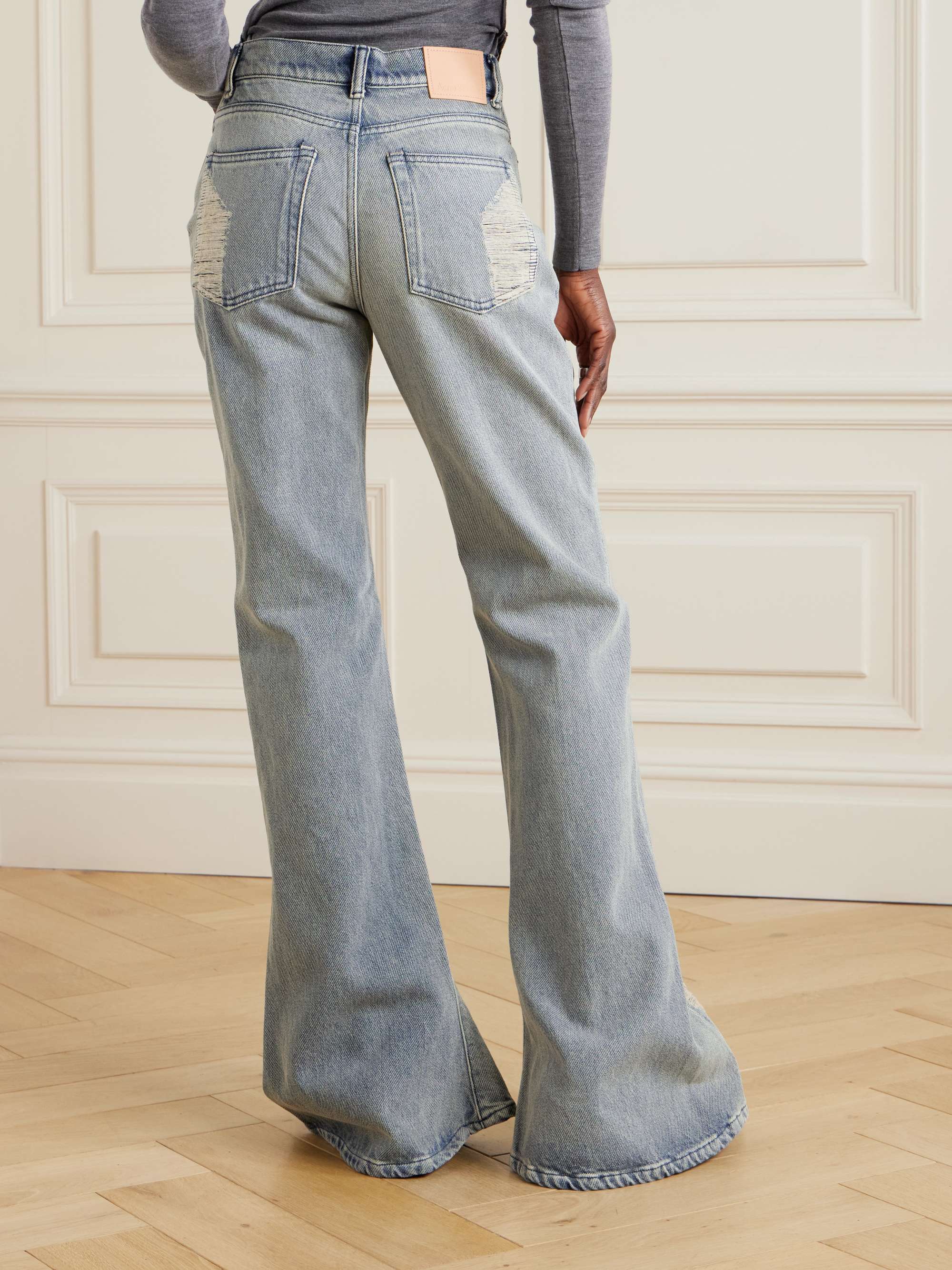 Distressed mid-rise flared jeans view