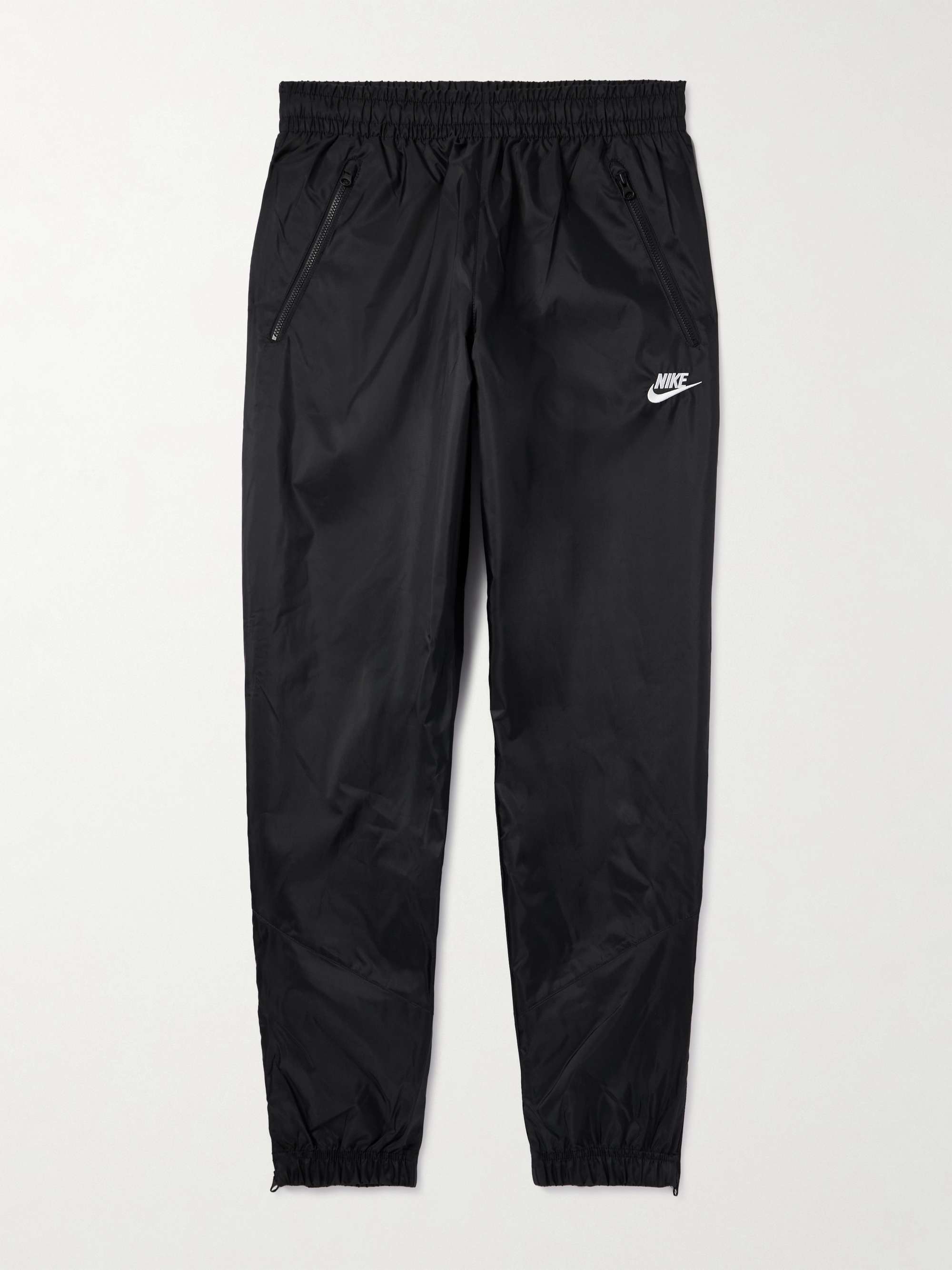 Windrunner Tapered Logo-Embroidered Shell Sweatpants hero visual