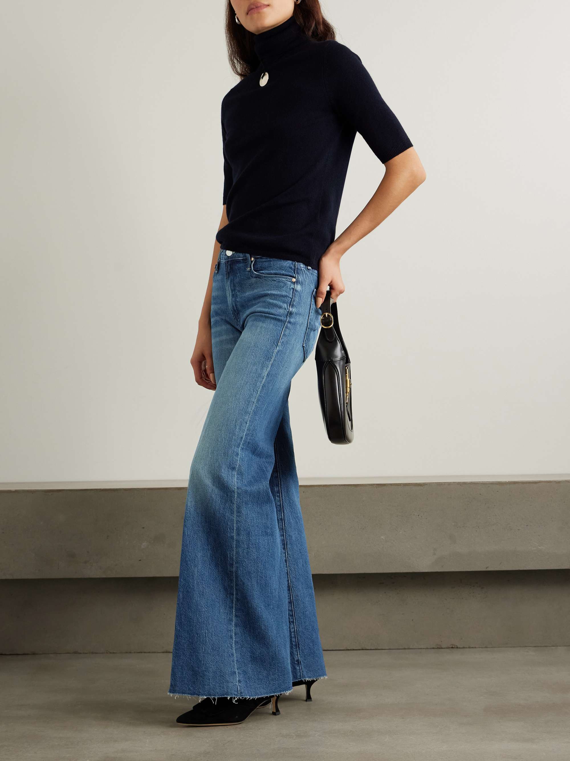 The Twister Sneak distressed high-rise wide-leg jeans view