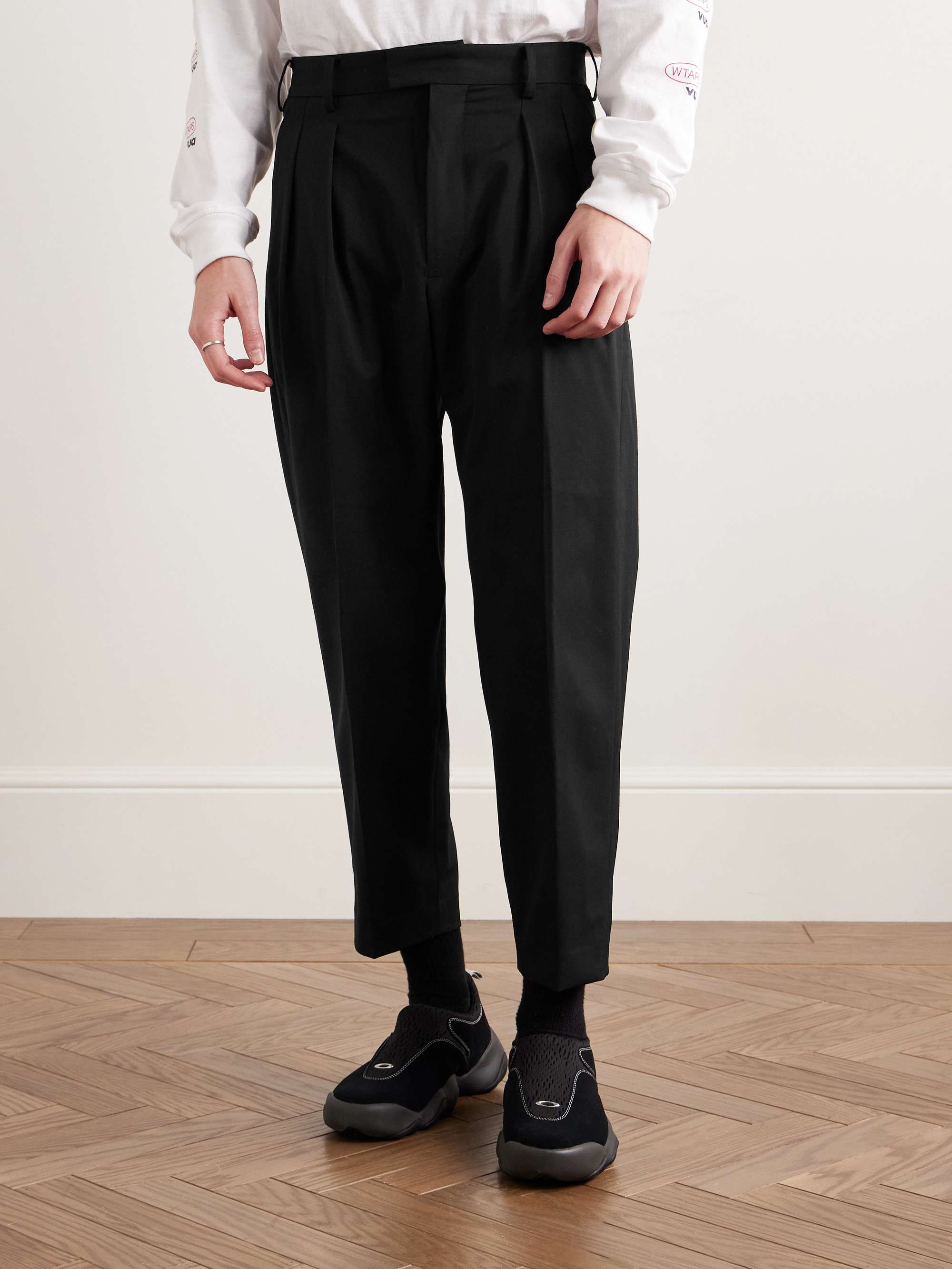 Cropped Tapered Logo-Appliquéd Pleated Twill Trousers view