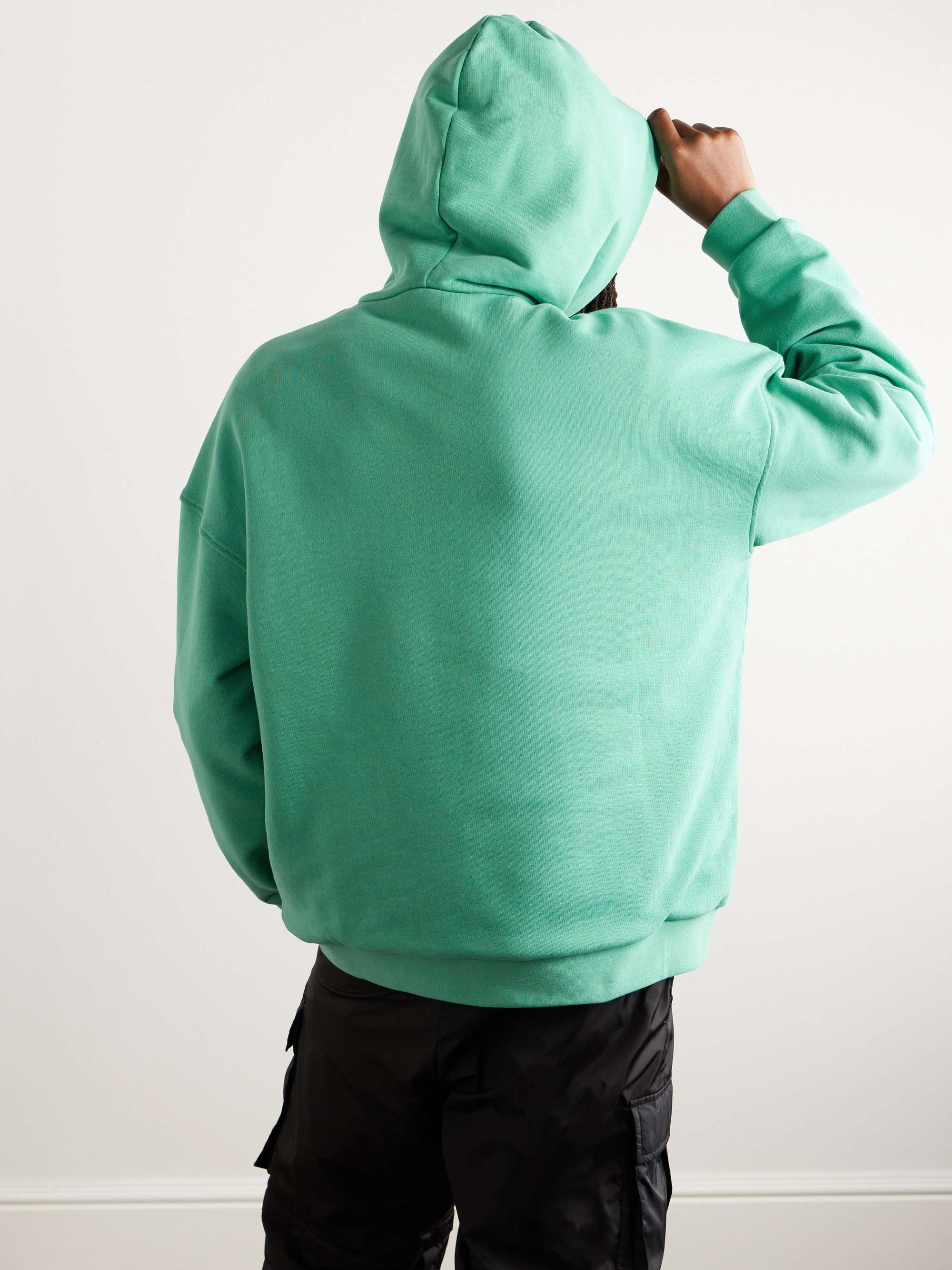+ Pharrell Williams Reversible Logo-Appliquéd Cotton-Jersey and Fleece Hoodie view