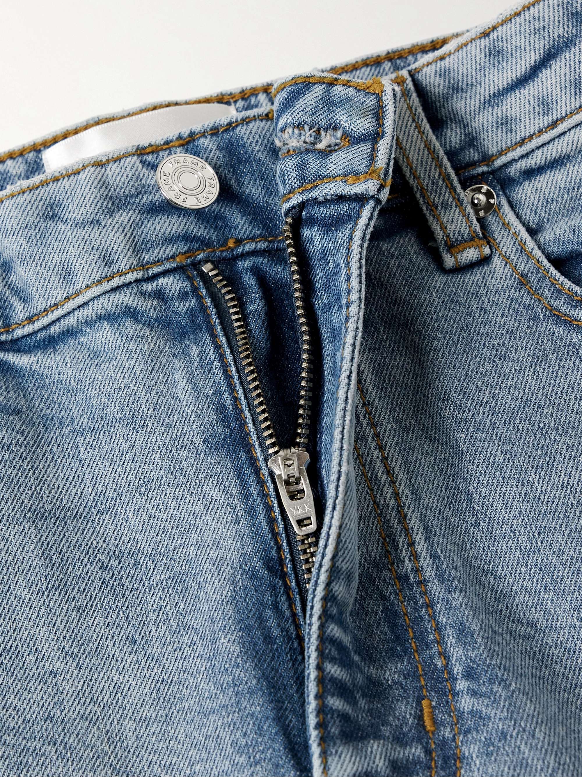 The Pixie Arrow cropped high-rise bootcut jeans view