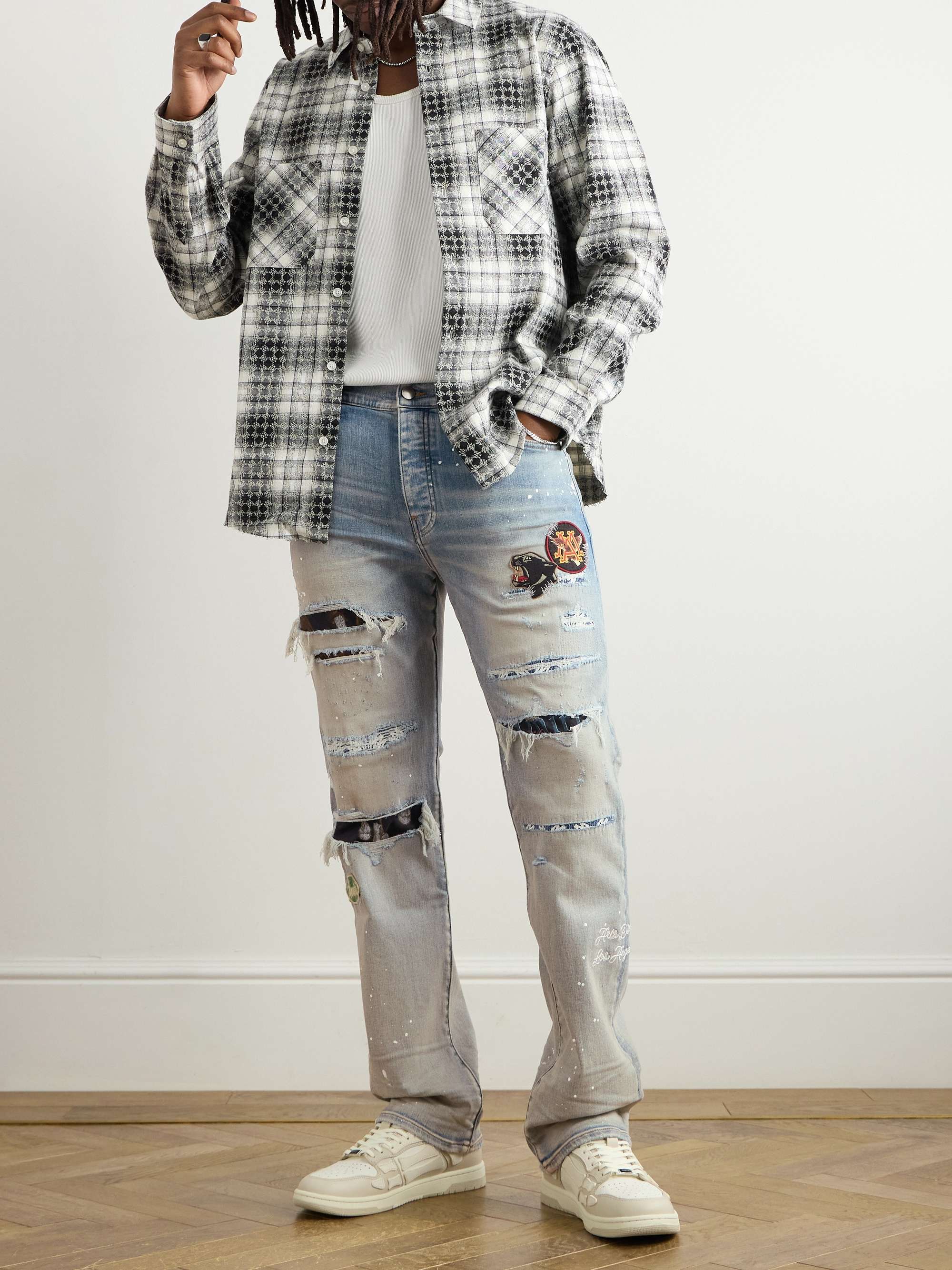 Skinny-Fit Appliquéd Distressed Paint-Splattered Jeans view