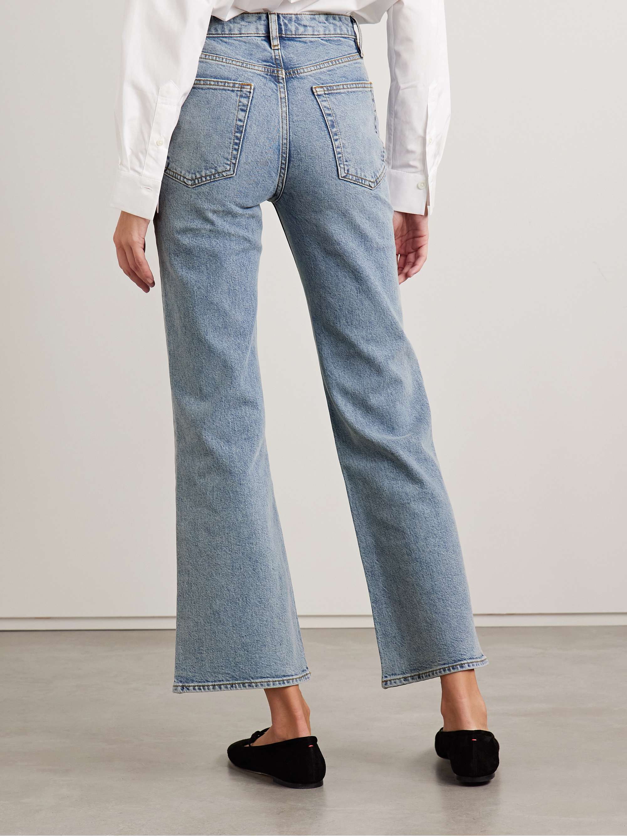 The Pixie Arrow cropped high-rise bootcut jeans view