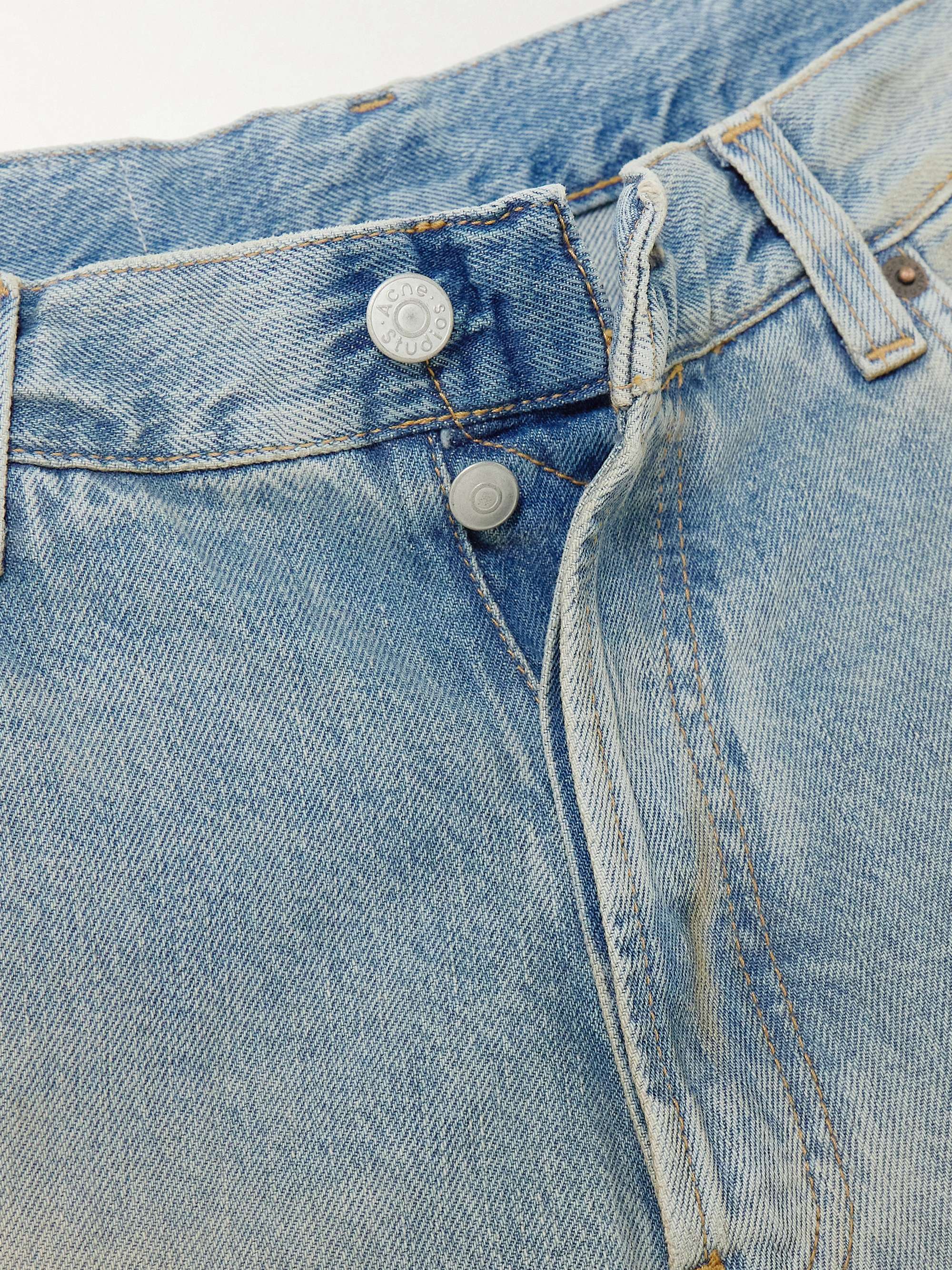 Distressed organic mid-rise wide-leg jeans view