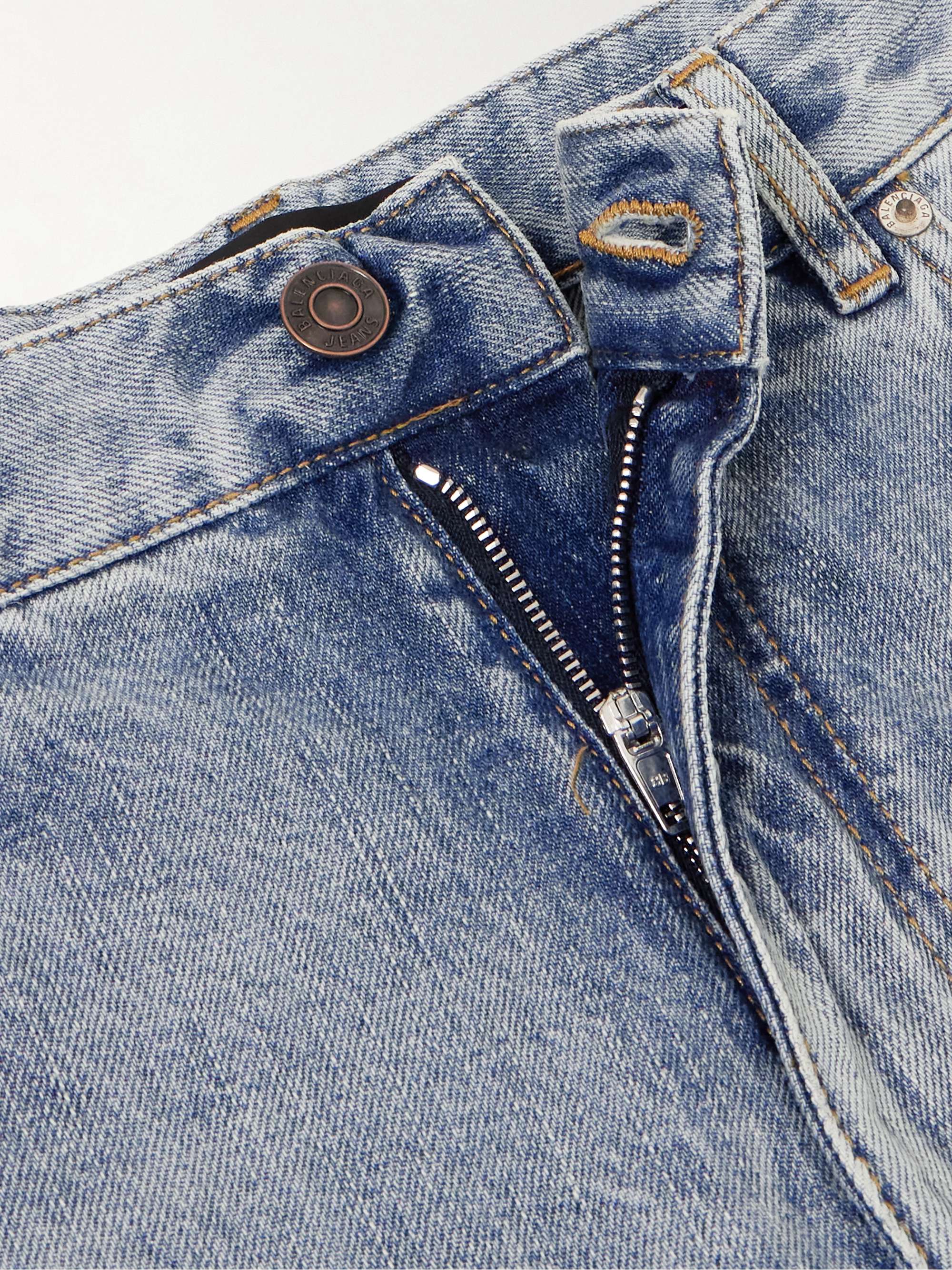 Distressed low-rise flared jeans view