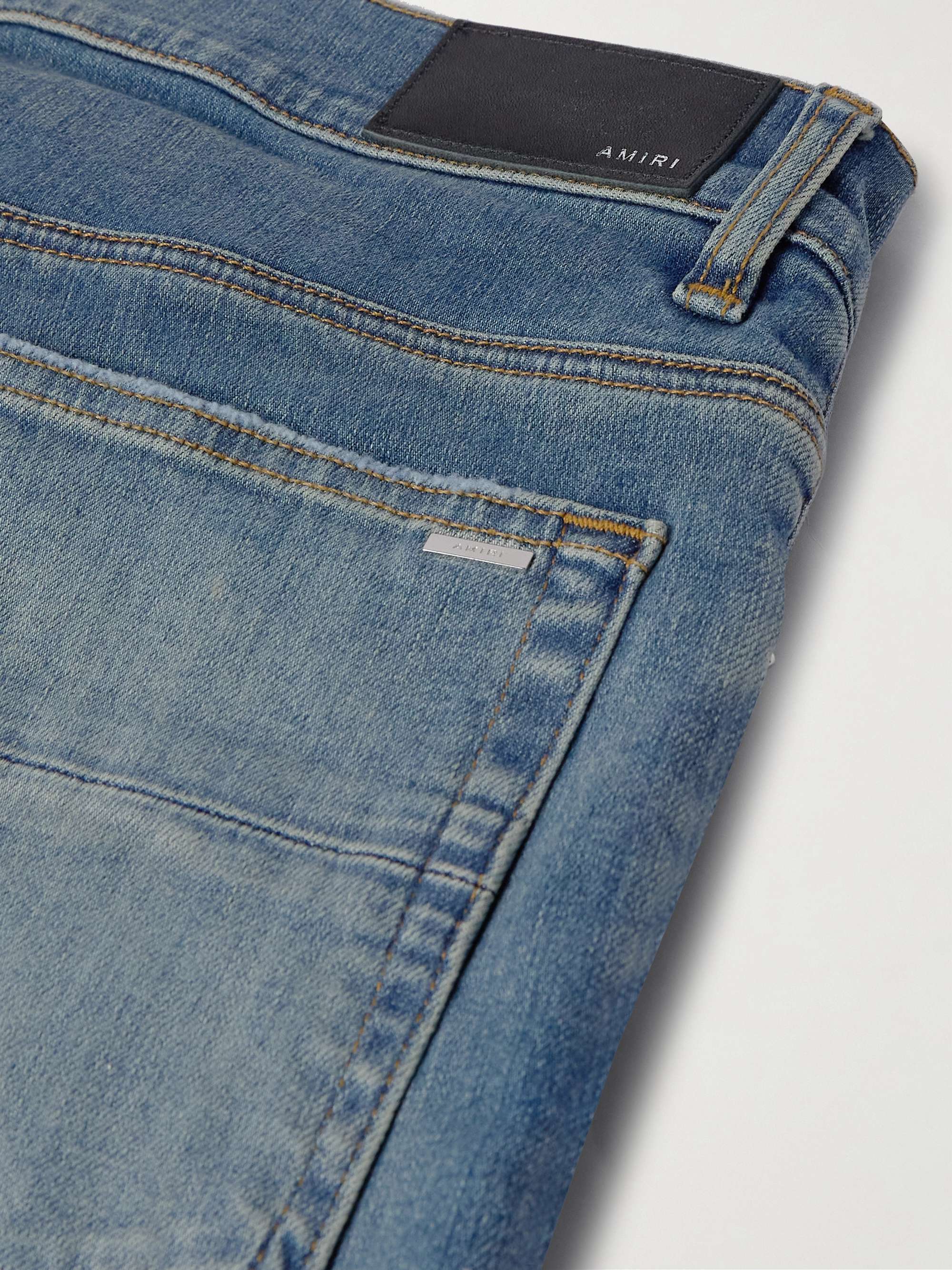 Skinny-Fit Distressed Patchwork Jeans view