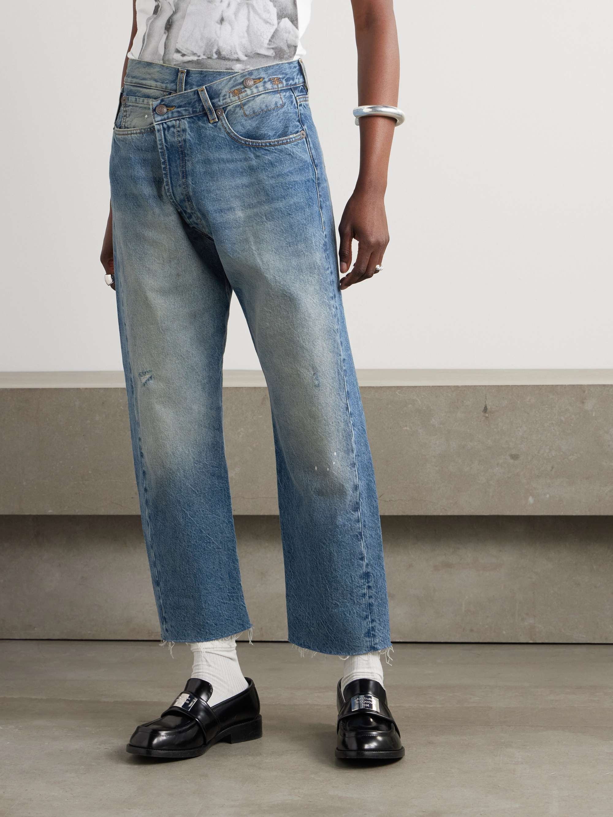Crossover asymmetric distressed high-rise wide-leg jeans view