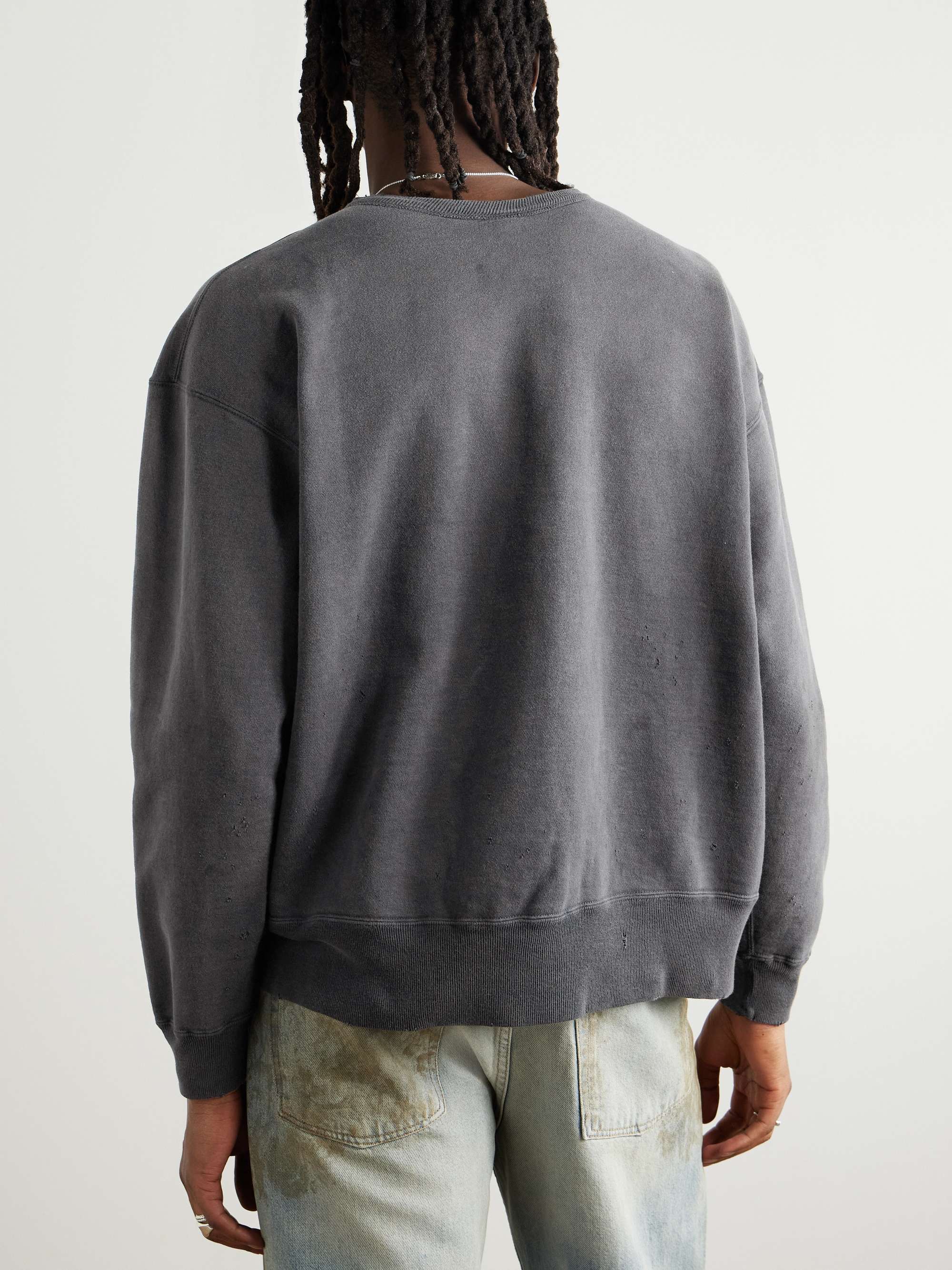 The Deviant Distressed Logo-Print Cotton-Jersey Sweatshirt view