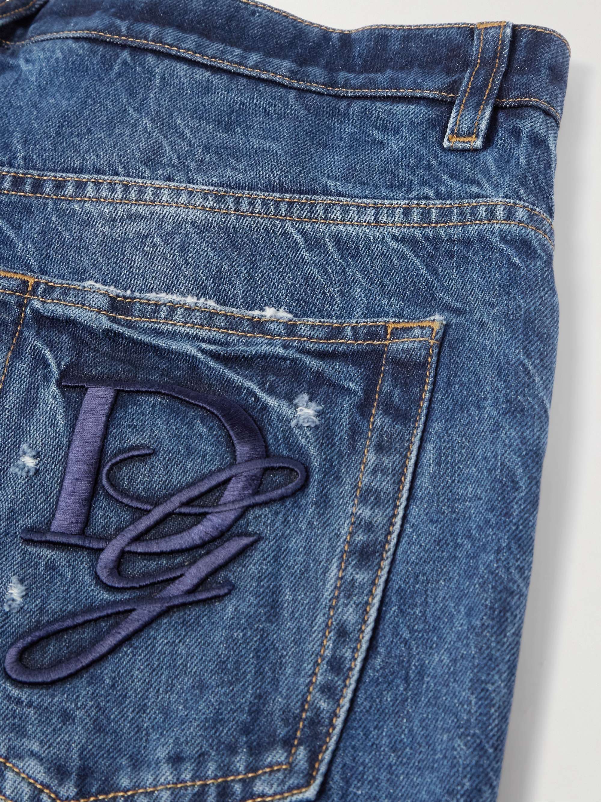 Slim-Fit Tapered Logo-Embroidered Distressed Jeans view