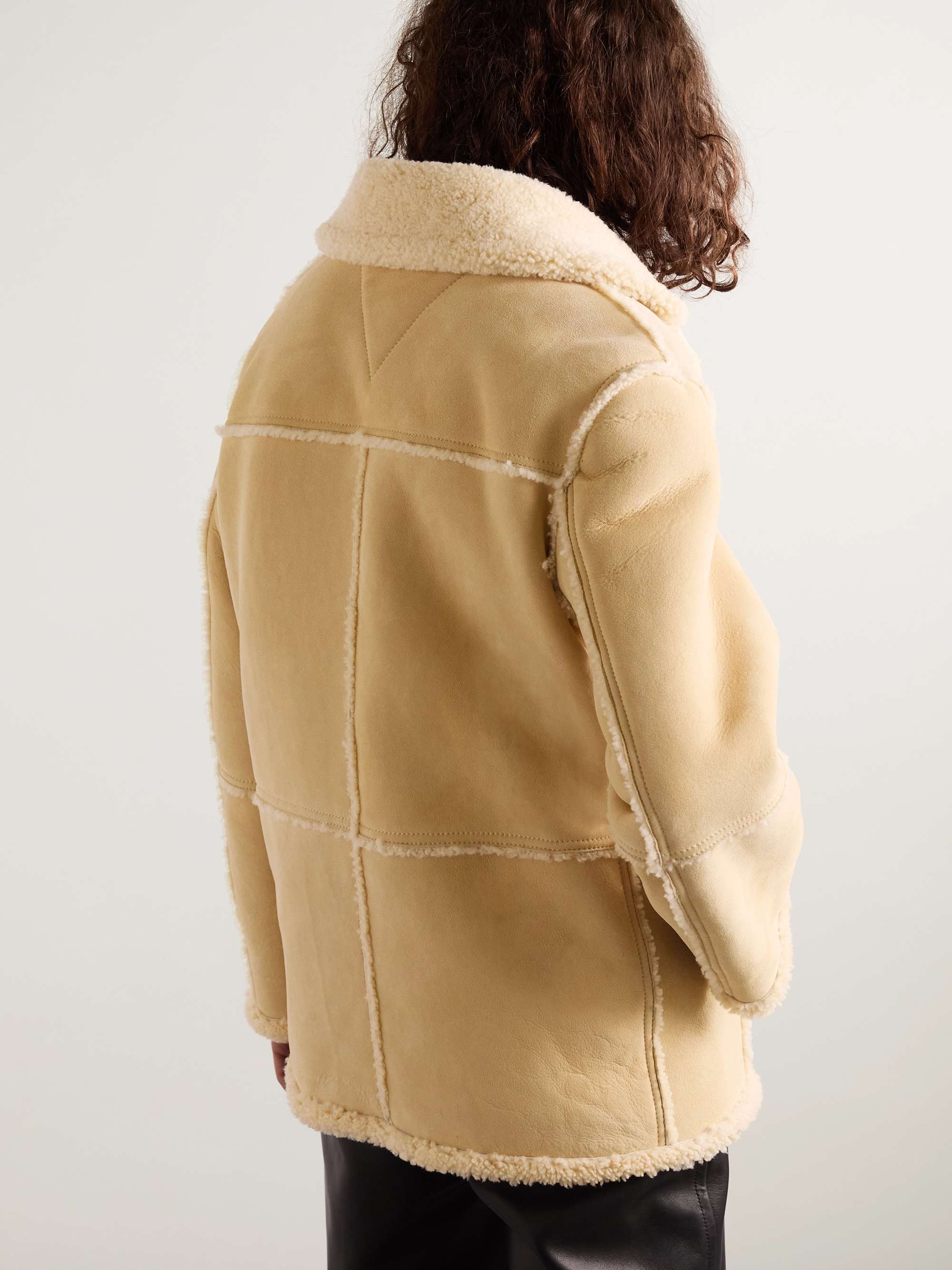 Double-breasted shearling coat view