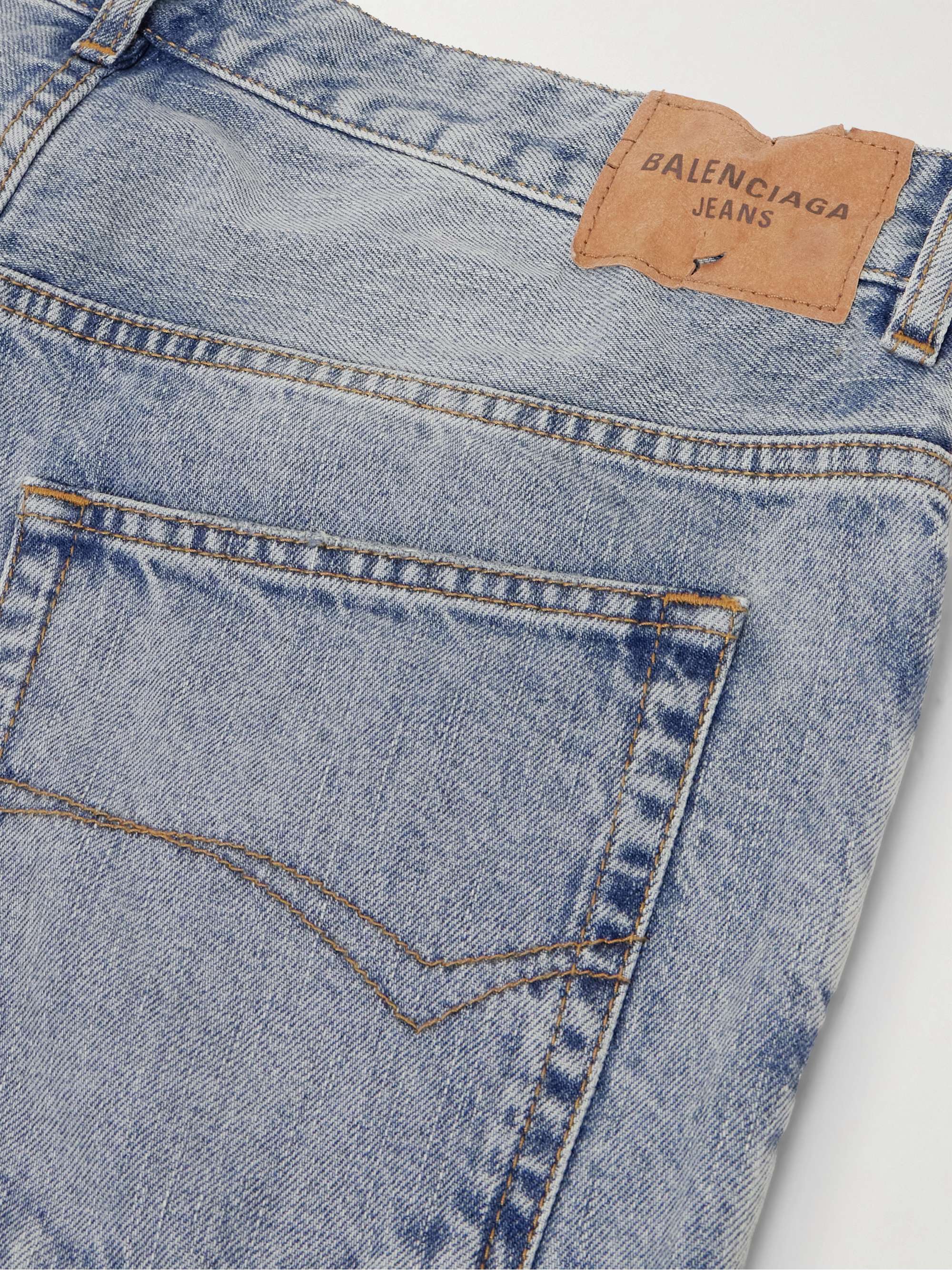 Distressed low-rise flared jeans view