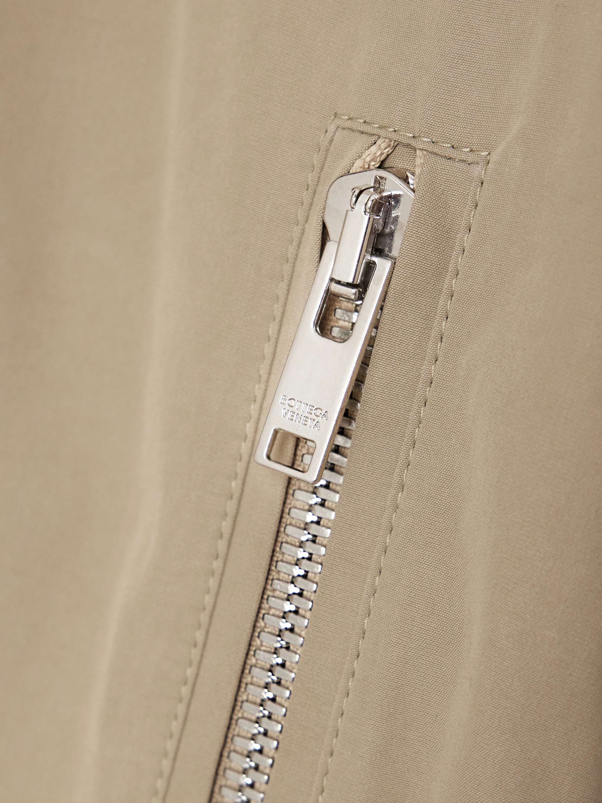 Belted asymmetric cotton-blend jacket view