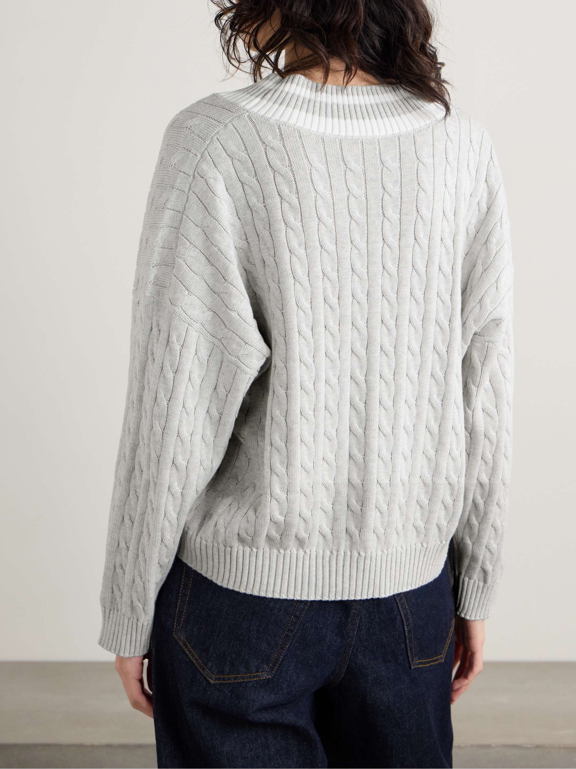 Oversized appliquéd cable-knit cotton sweater view