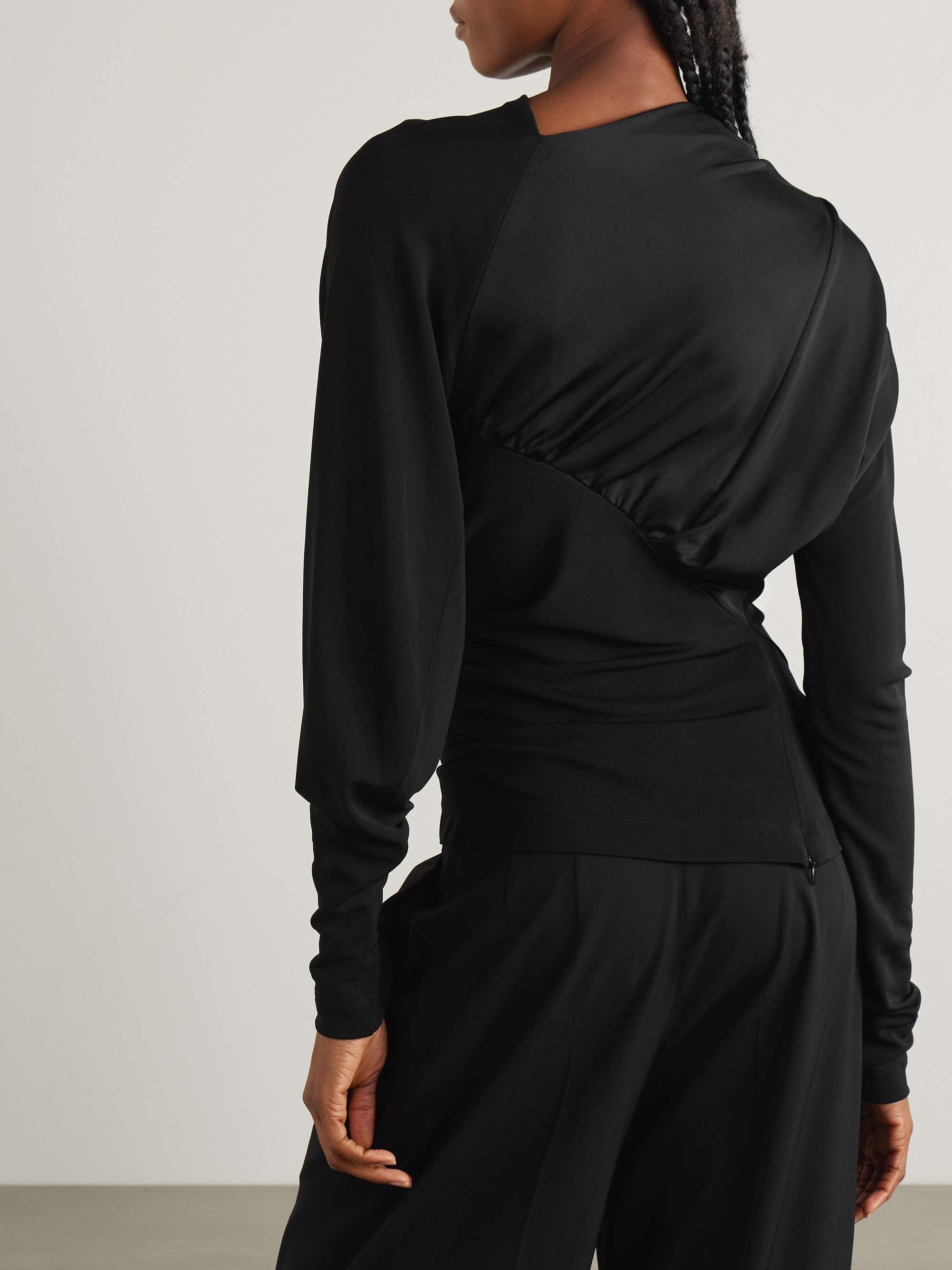 Asymmetric embellished draped jersey top view