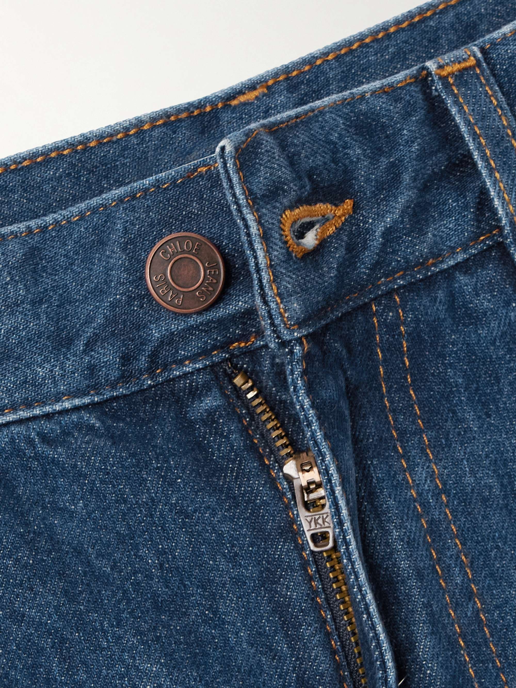 Cropped distressed high-rise wide-leg jeans view