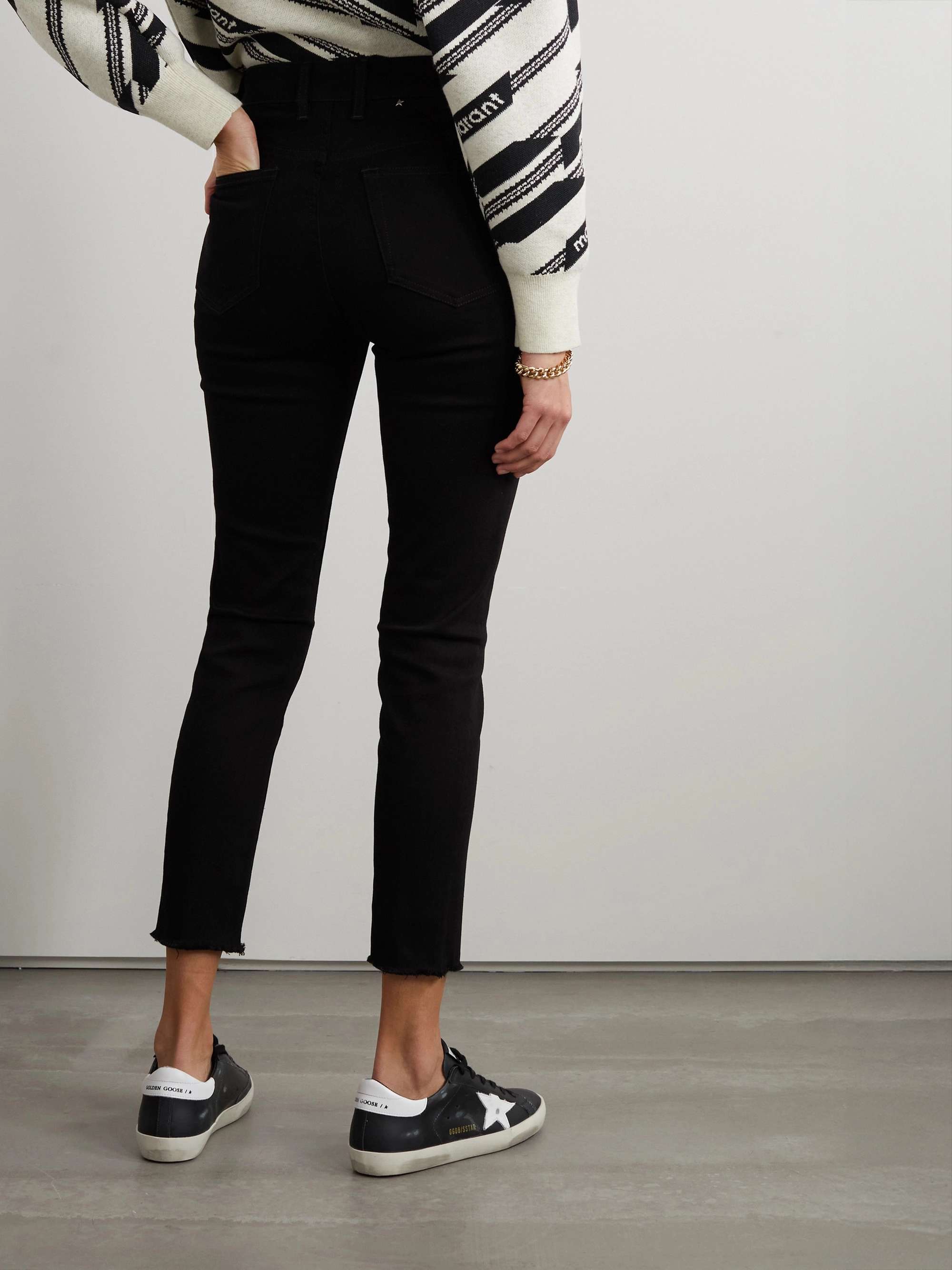 Frayed high-rise skinny jeans view