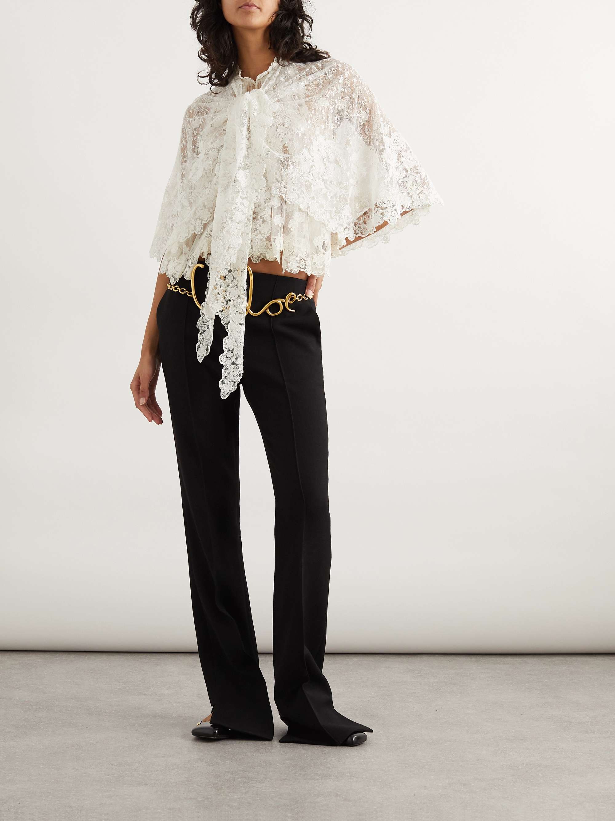 Cape-effect knotted lace blouse view