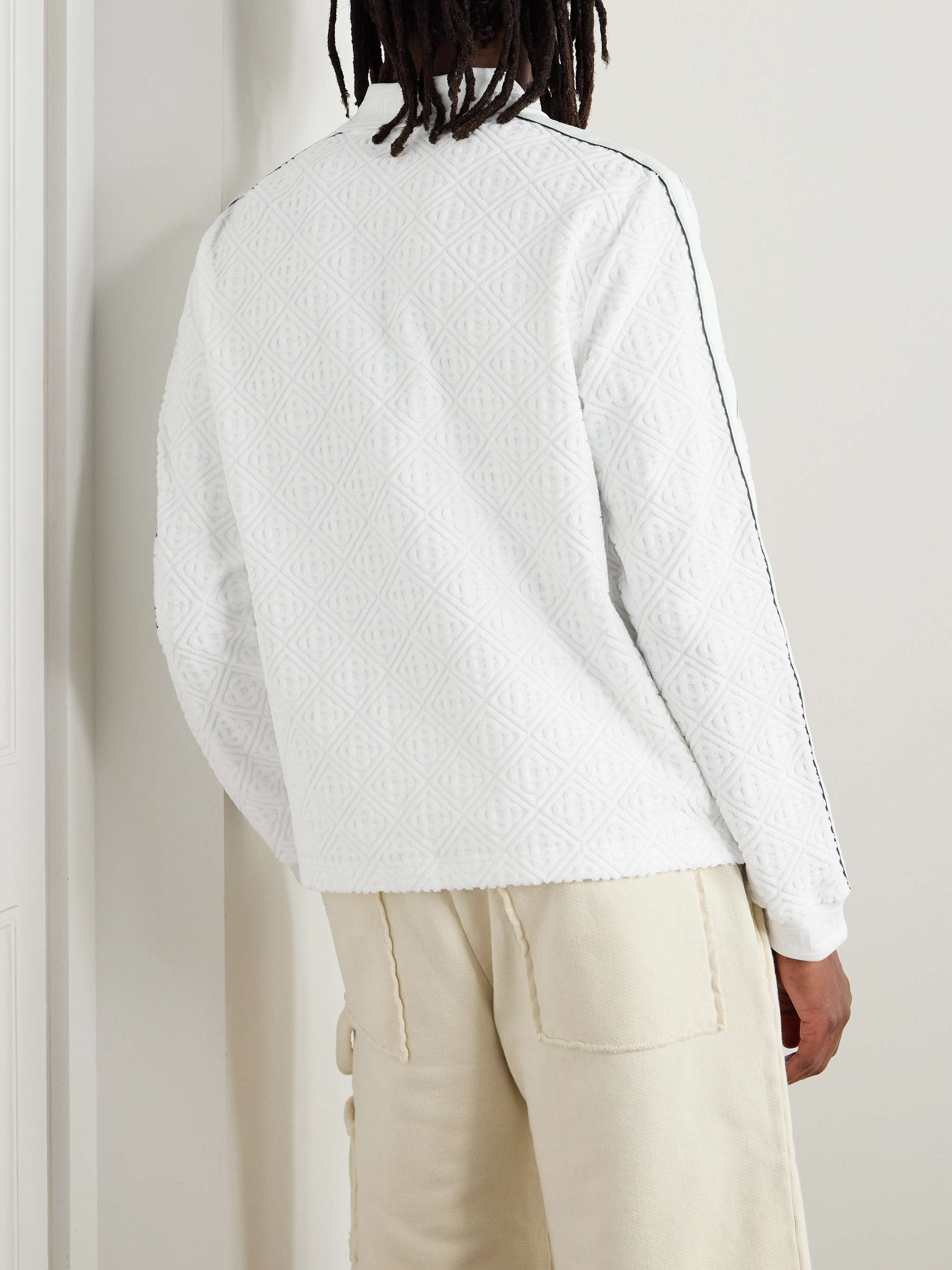 Logo-Appliquéd Striped Cotton-Blend Terry-Jacquard Polo Shirt view