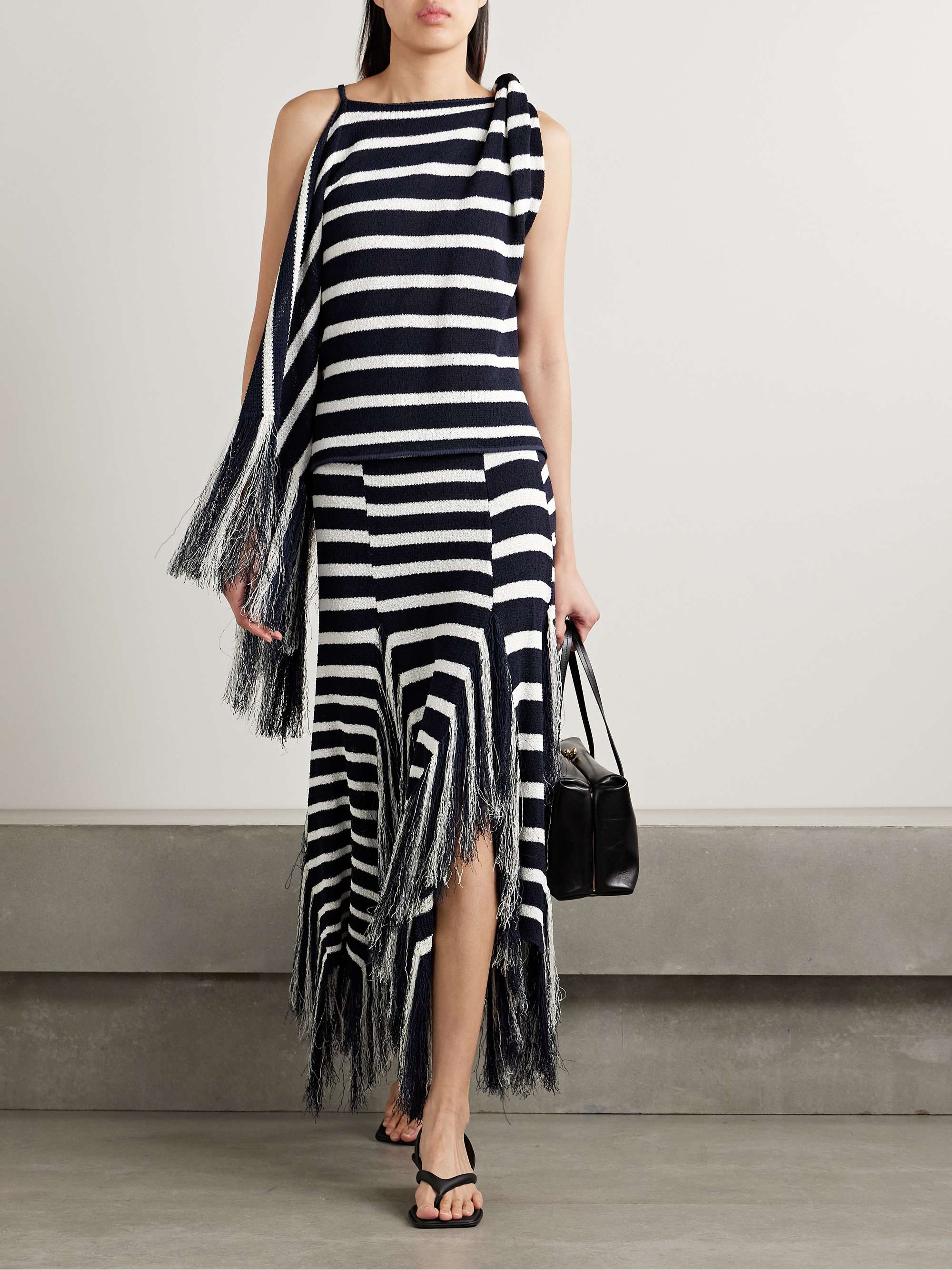 Yves asymmetric fringed knitted top view