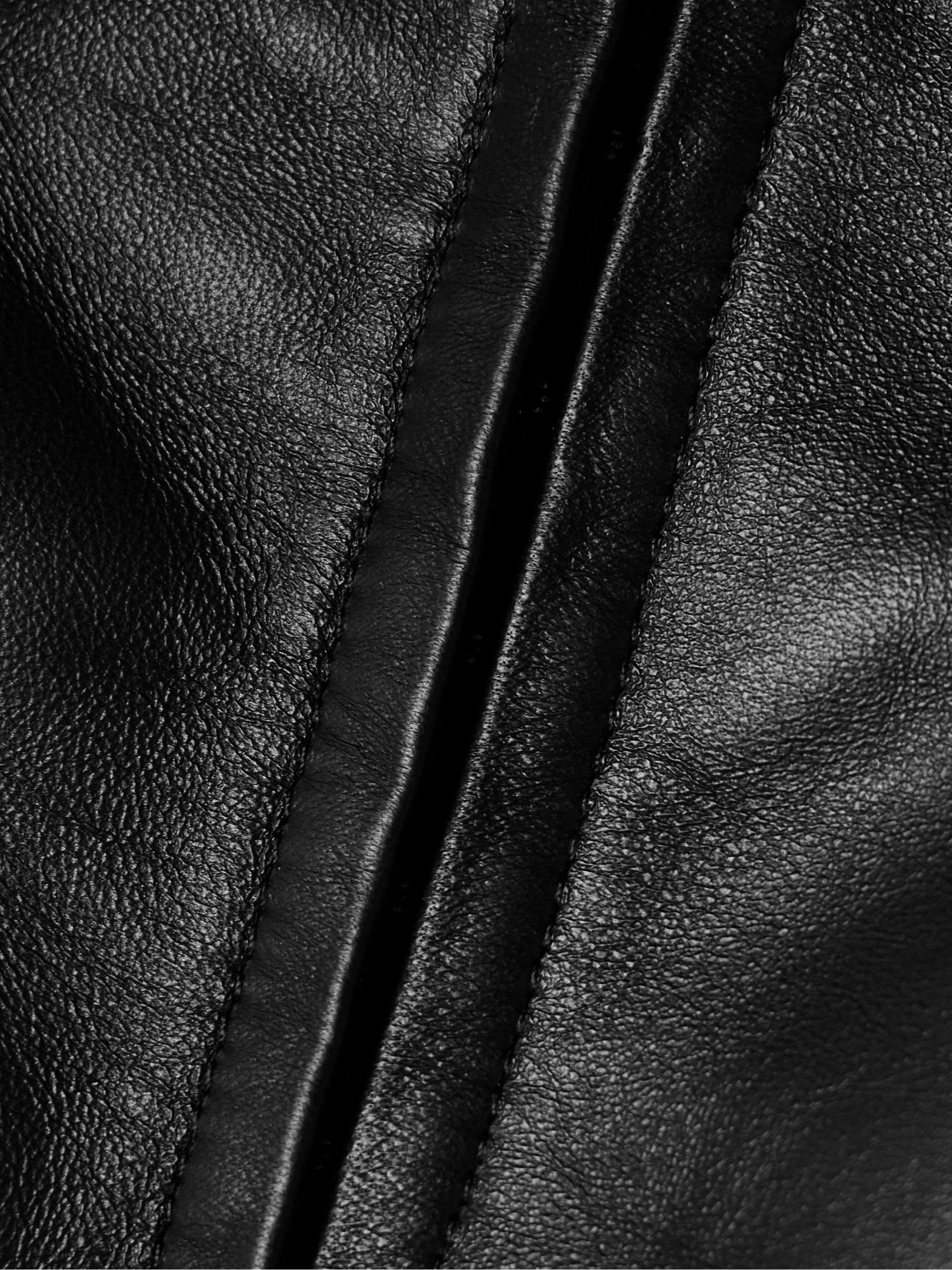 Paneled leather and lace bustier top view