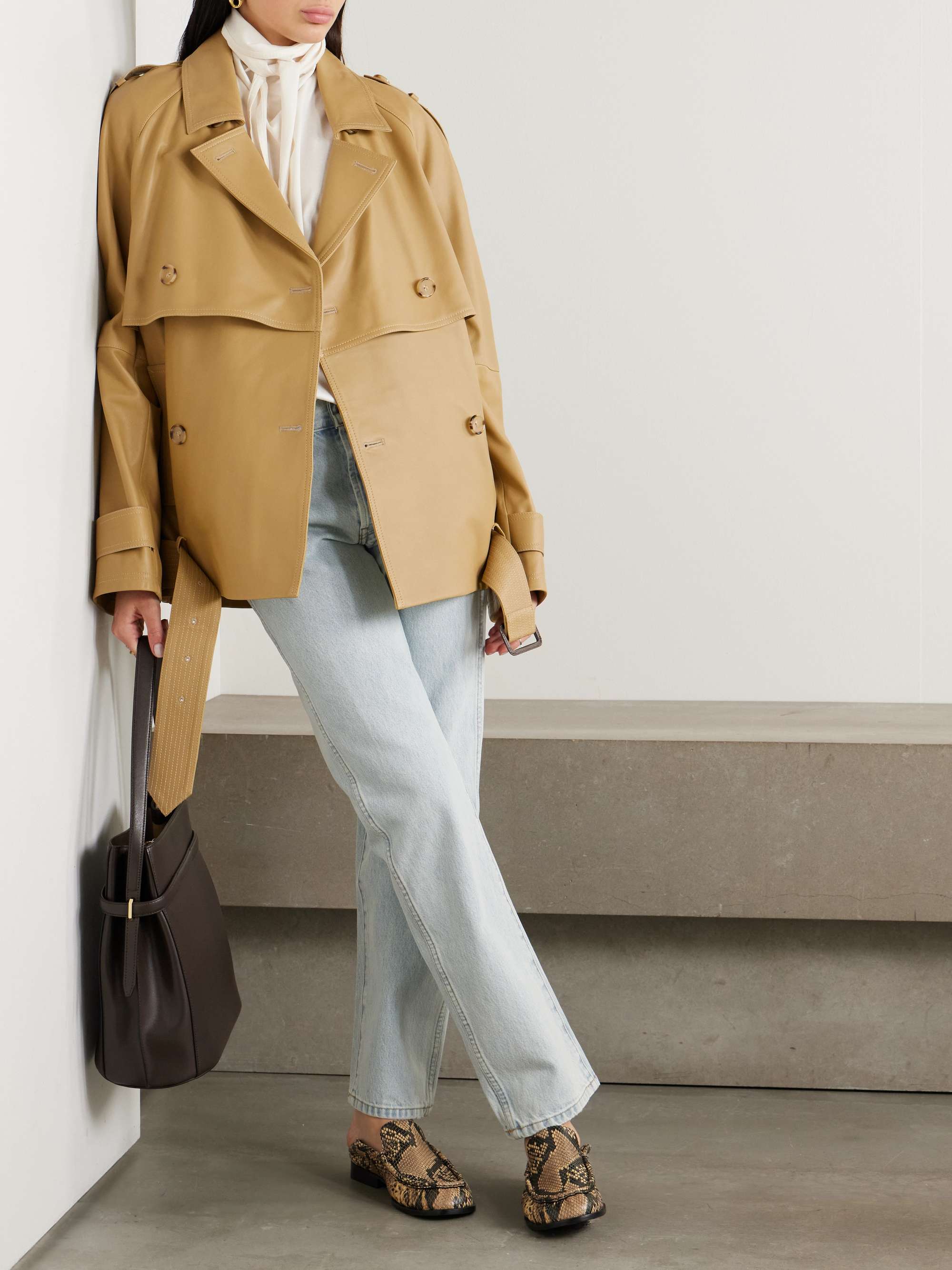 Double-breasted belted layered leather jacket view
