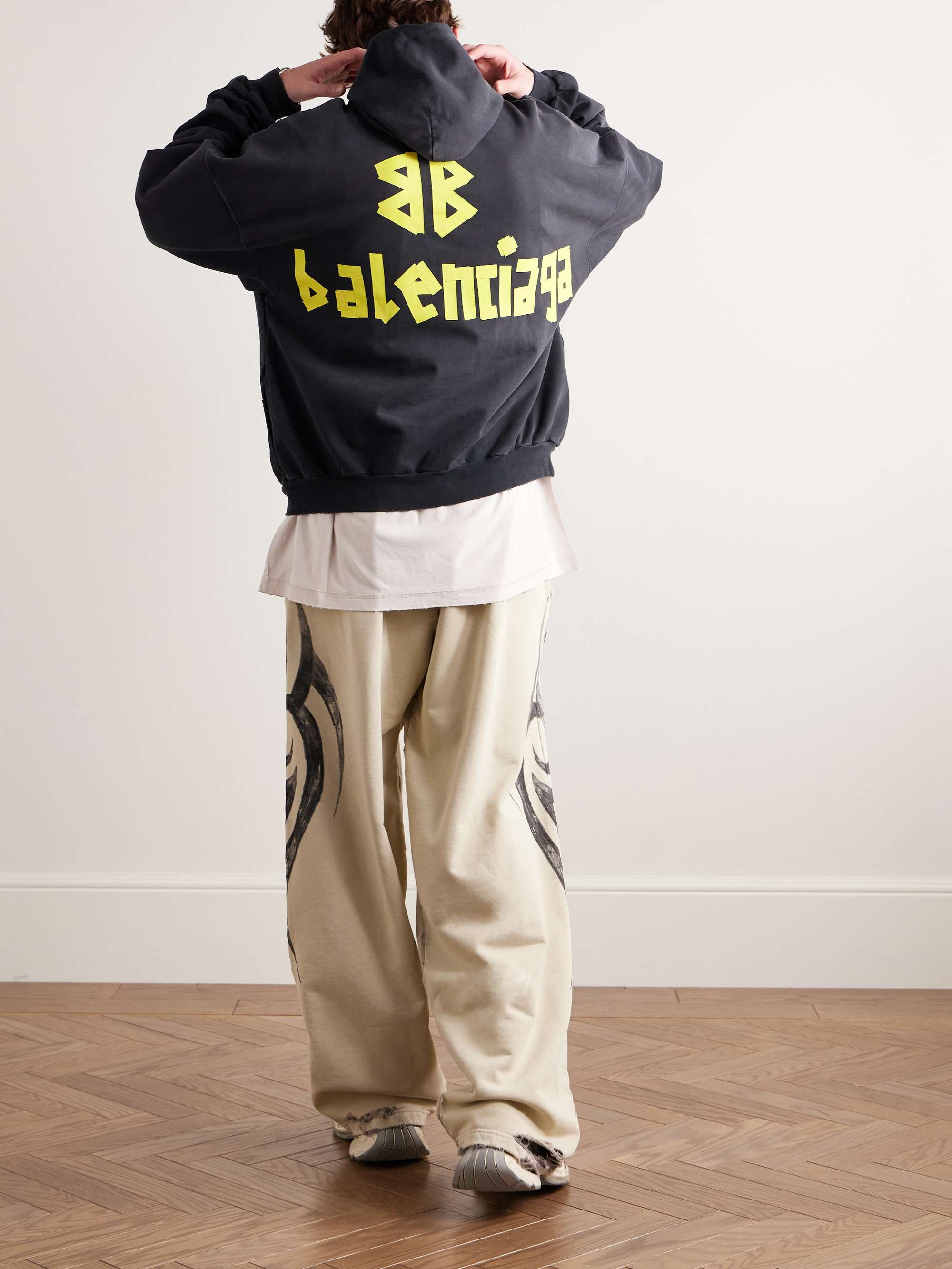 Tape Type Oversized Distressed Logo-Print Cotton-Jersey Hoodie view
