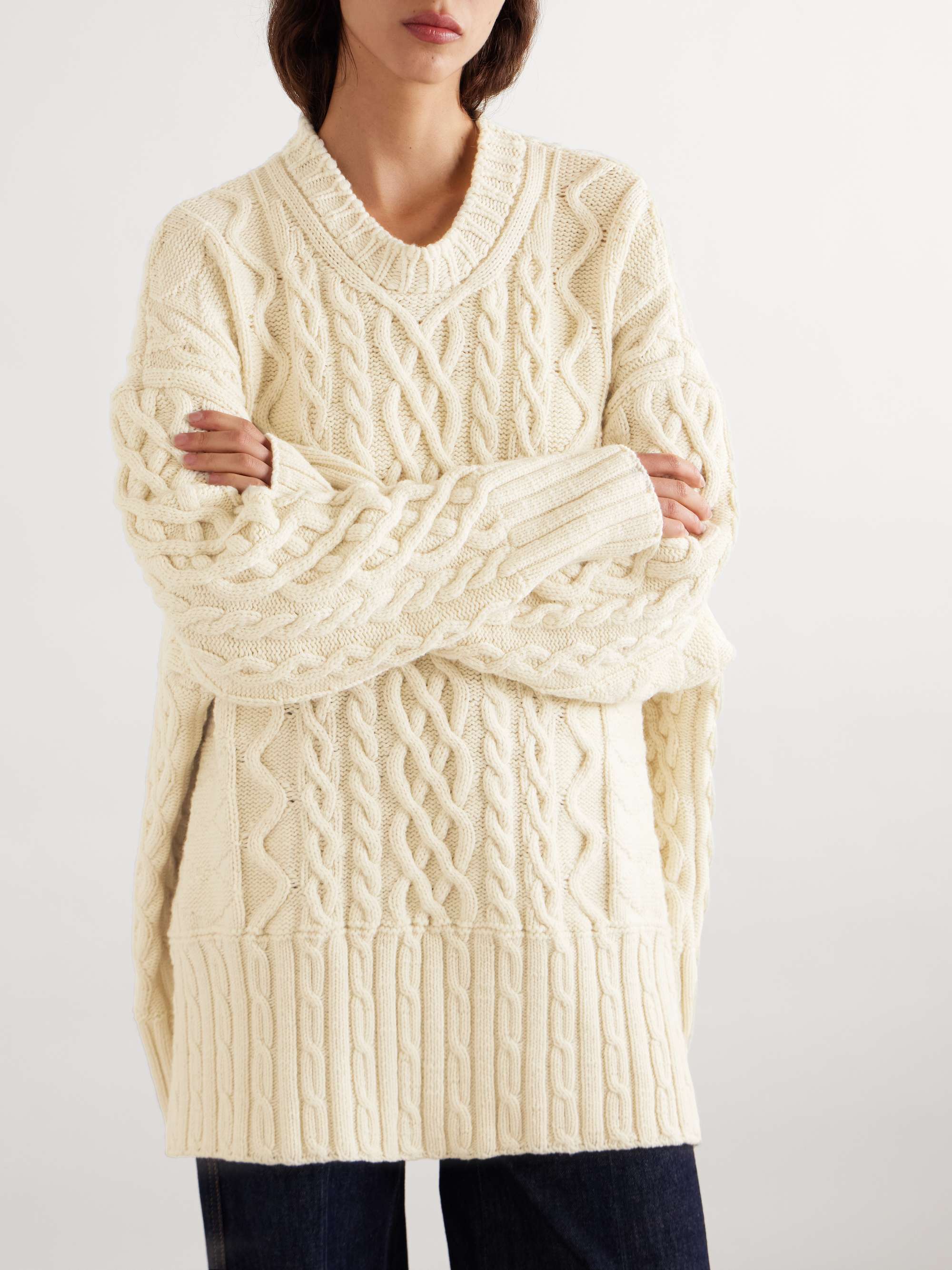 Oversized cable-knit wool sweater view