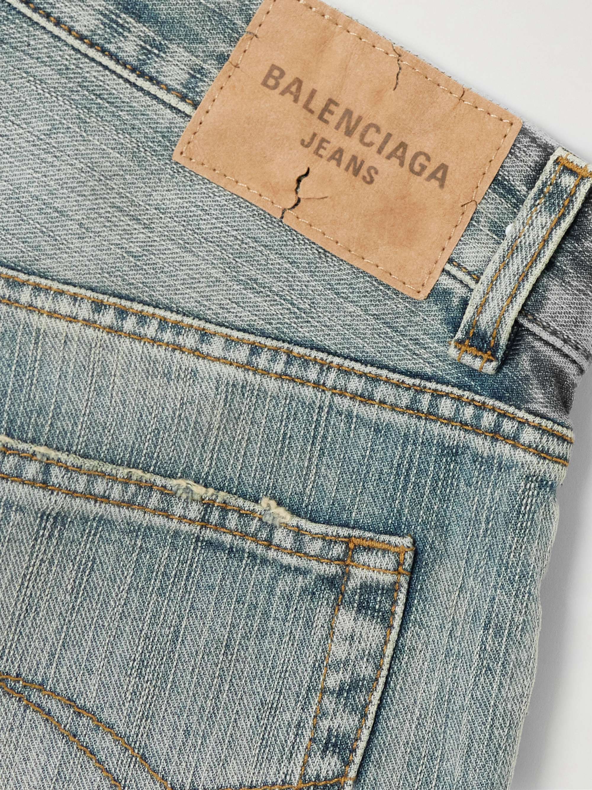 Distressed mid-rise wide-leg jeans view