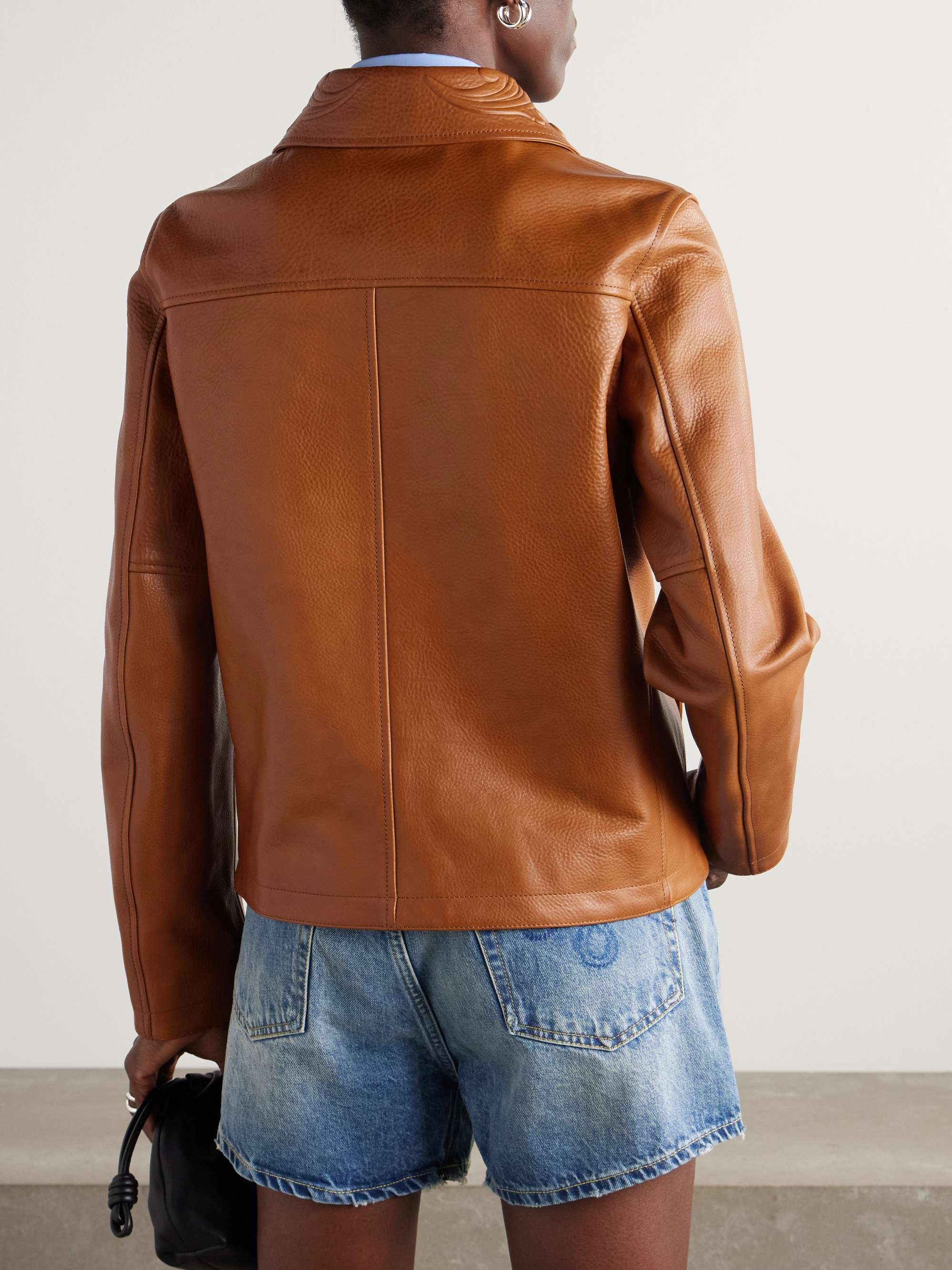 Debossed paneled textured-leather jacket view