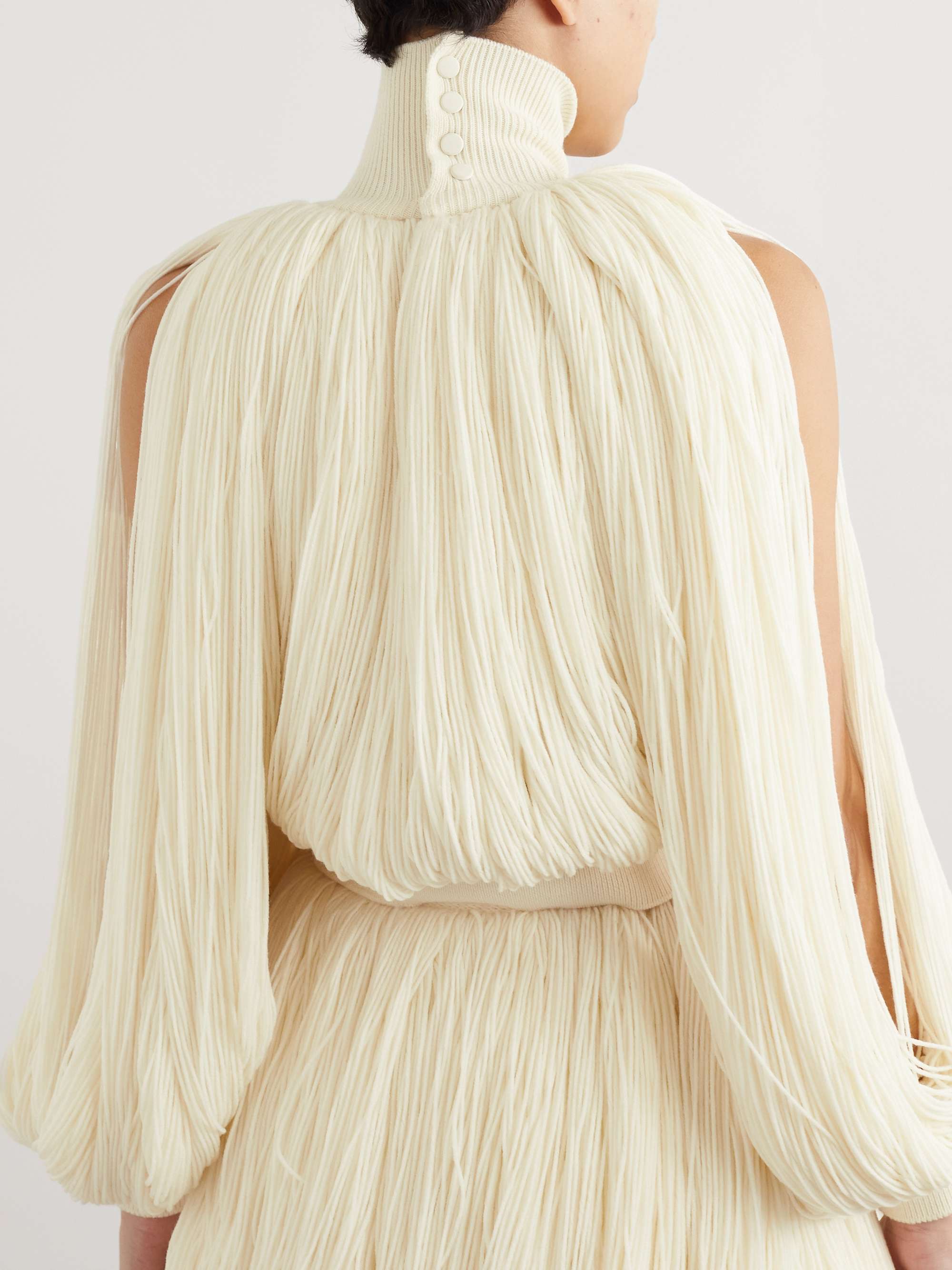 Fringed wool-blend turtleneck top view