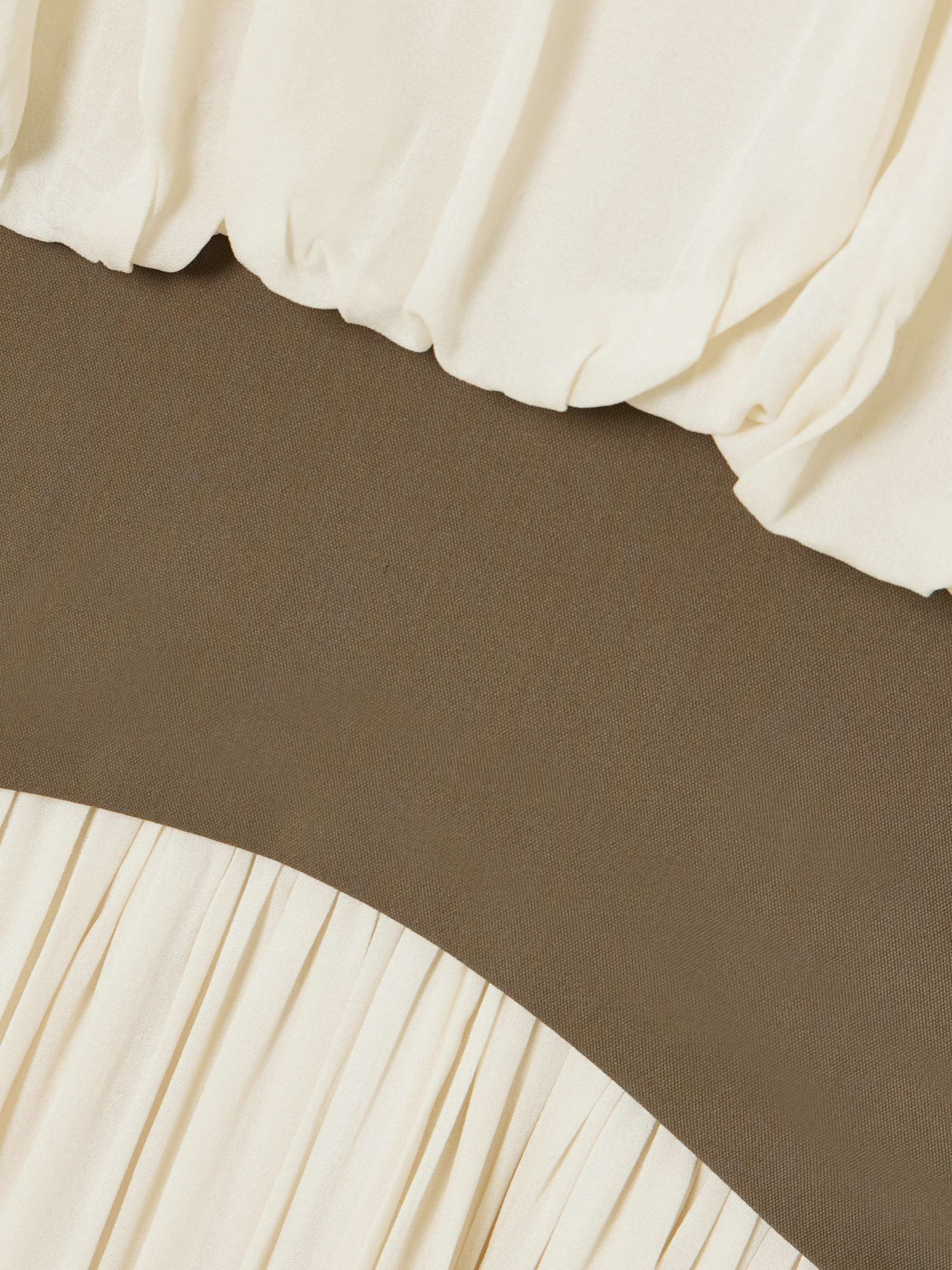 Bubble grain de poudre-trimmed pleated chiffon gown view